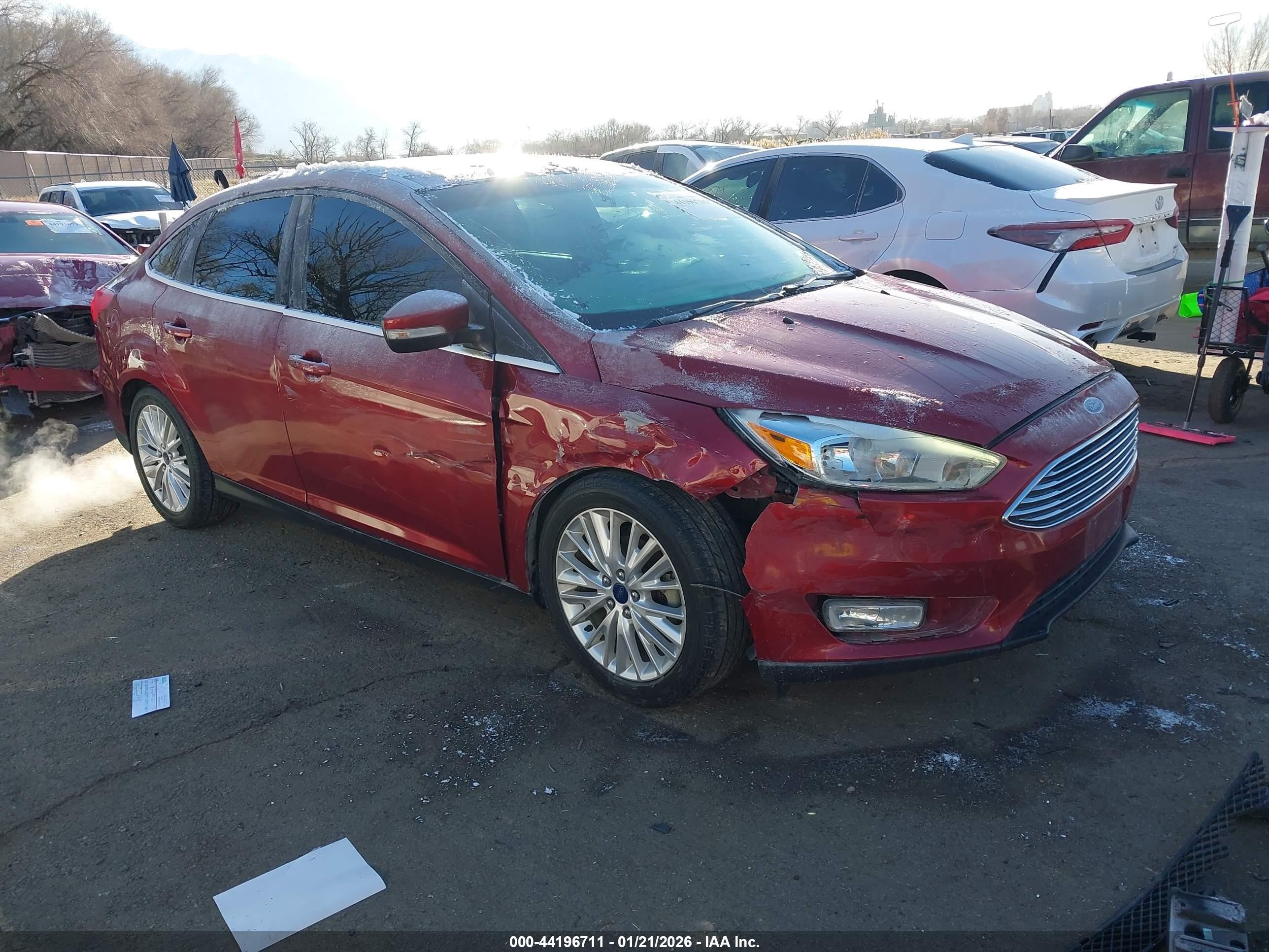 2015 Ford Focus Titanium, VIN 1FADP3J21FL235485 — Side