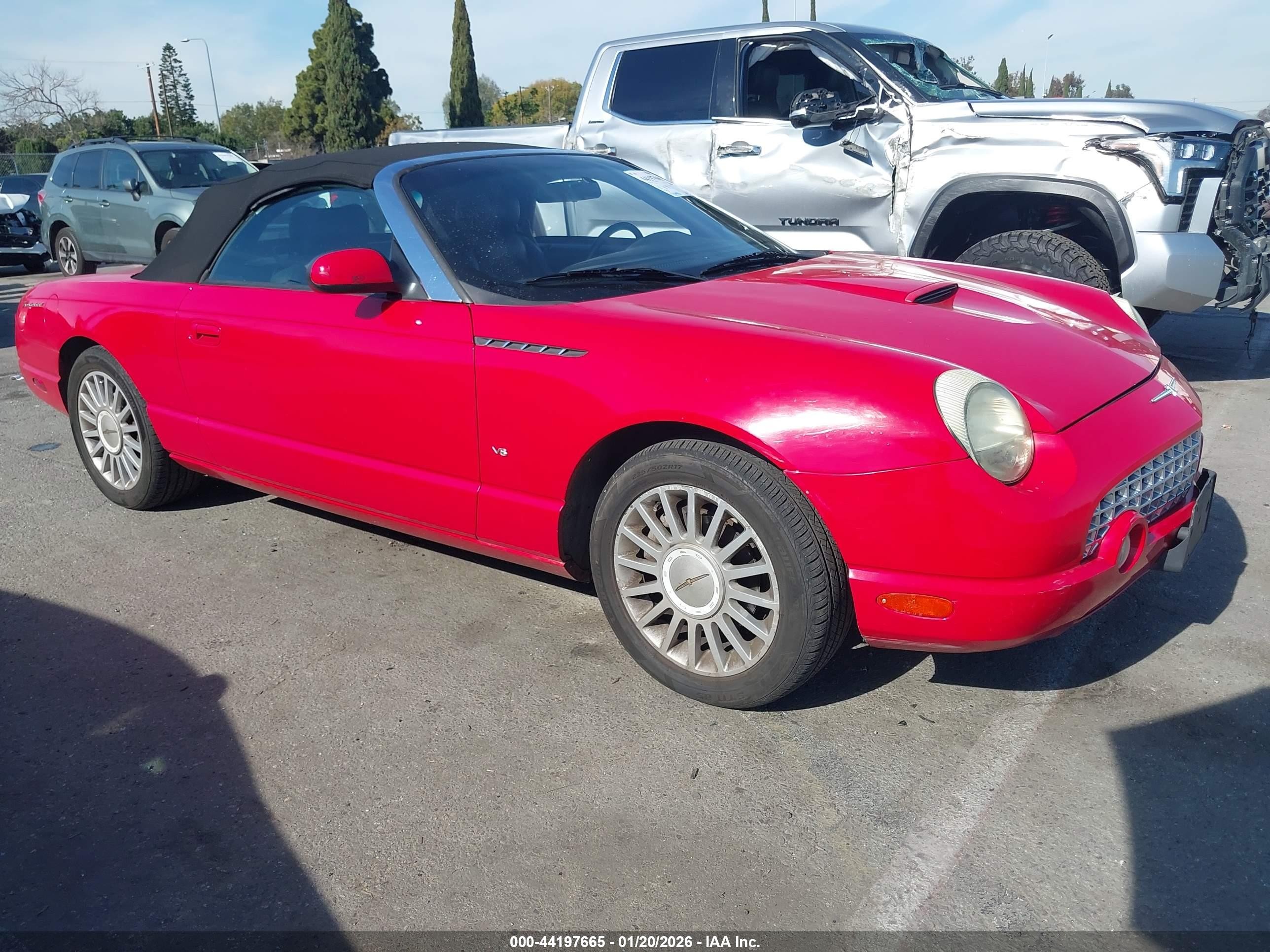 2004 Ford Thunderbird Deluxe, VIN 1FAHP60A34Y105011 — Side