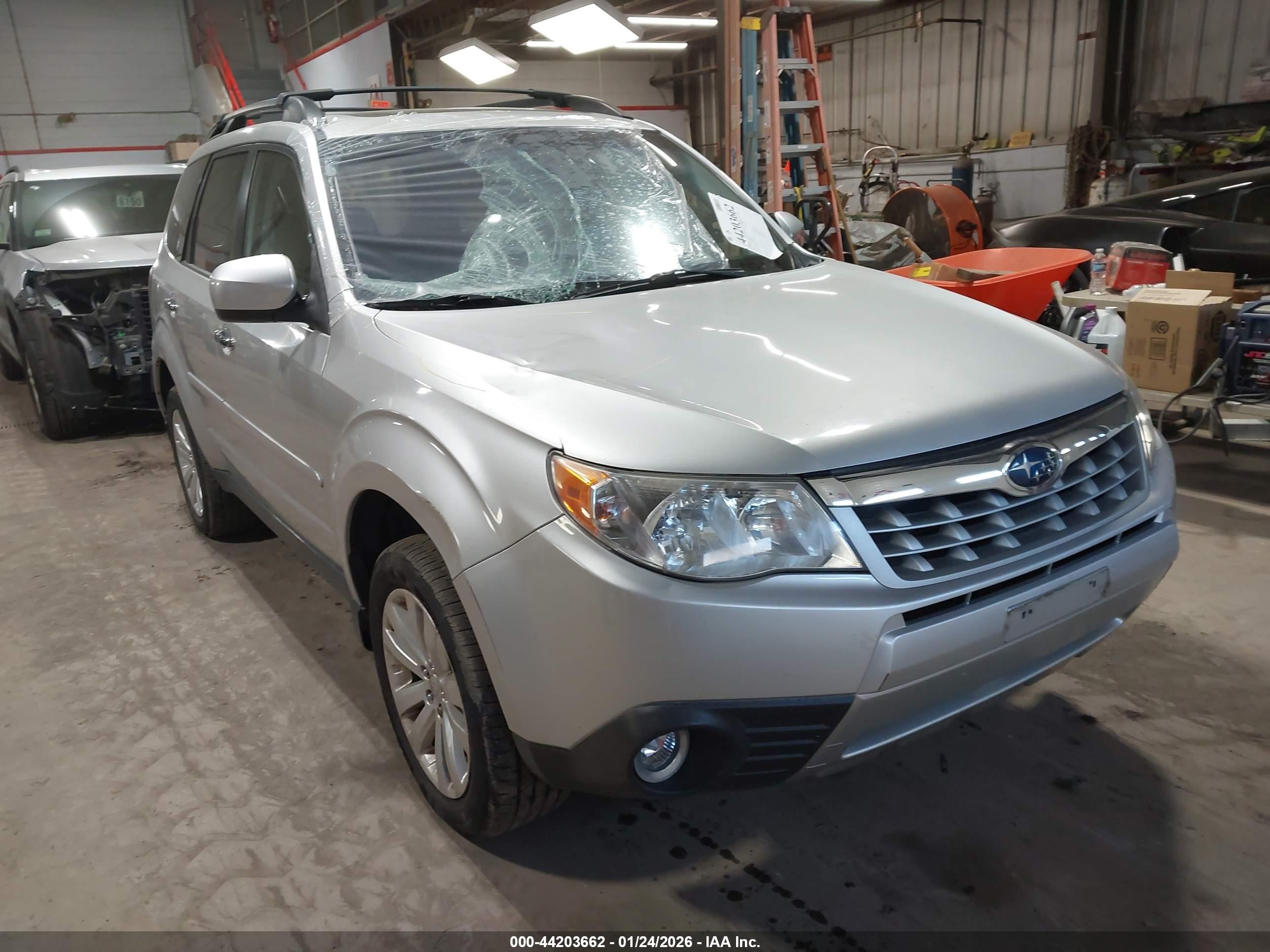 2011 Subaru Forester X Premium, VIN JF2SHBDC4BH742926 — Vandalism
