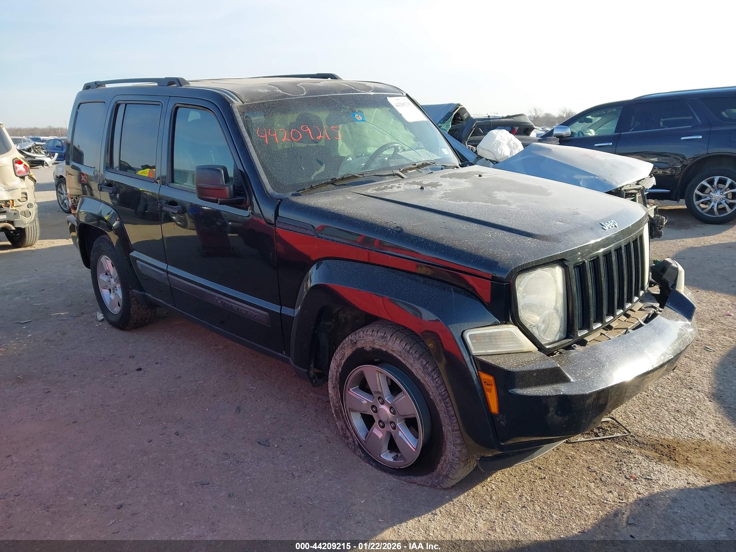 2010 Jeep Liberty Sport, VIN 1J4PP2GK6AW110671 — Side
