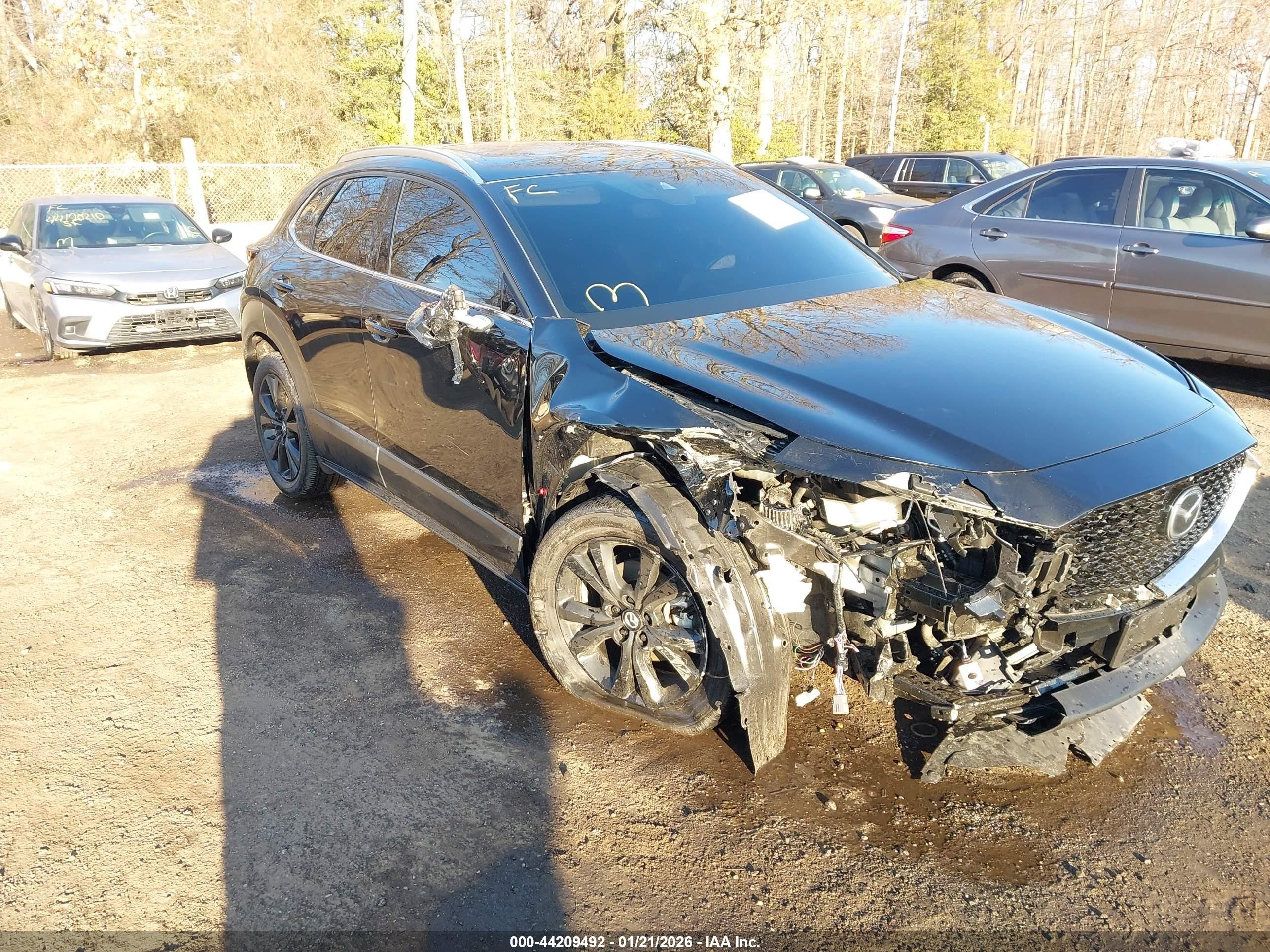 2022 Mazda CX-30 Premium Plus, VIN 3MVDMBEY9NM447347 — Front end
