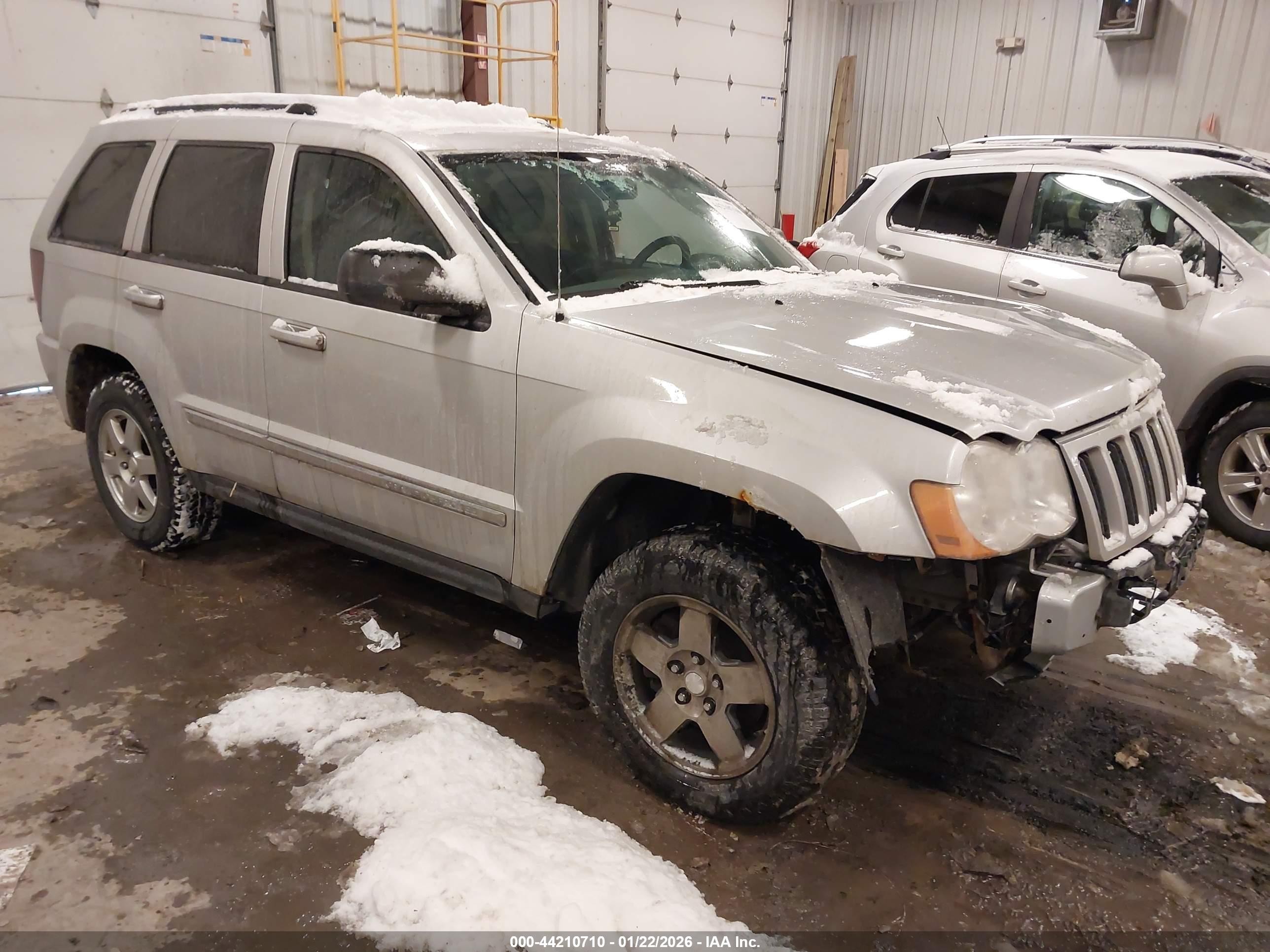 2010 Jeep Grand Cherokee Laredo, VIN 1J4PR4GKXAC140246 — Front end