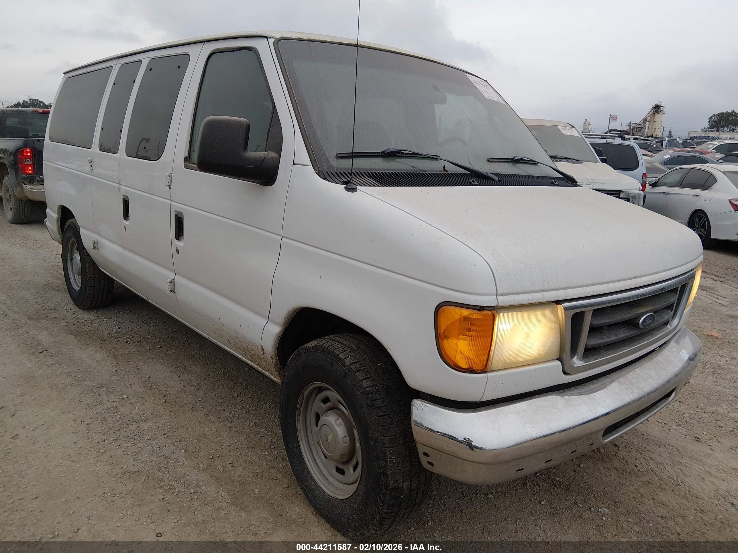 2006 Ford E-150, VIN 1FDRE11W26HA17874 — Side