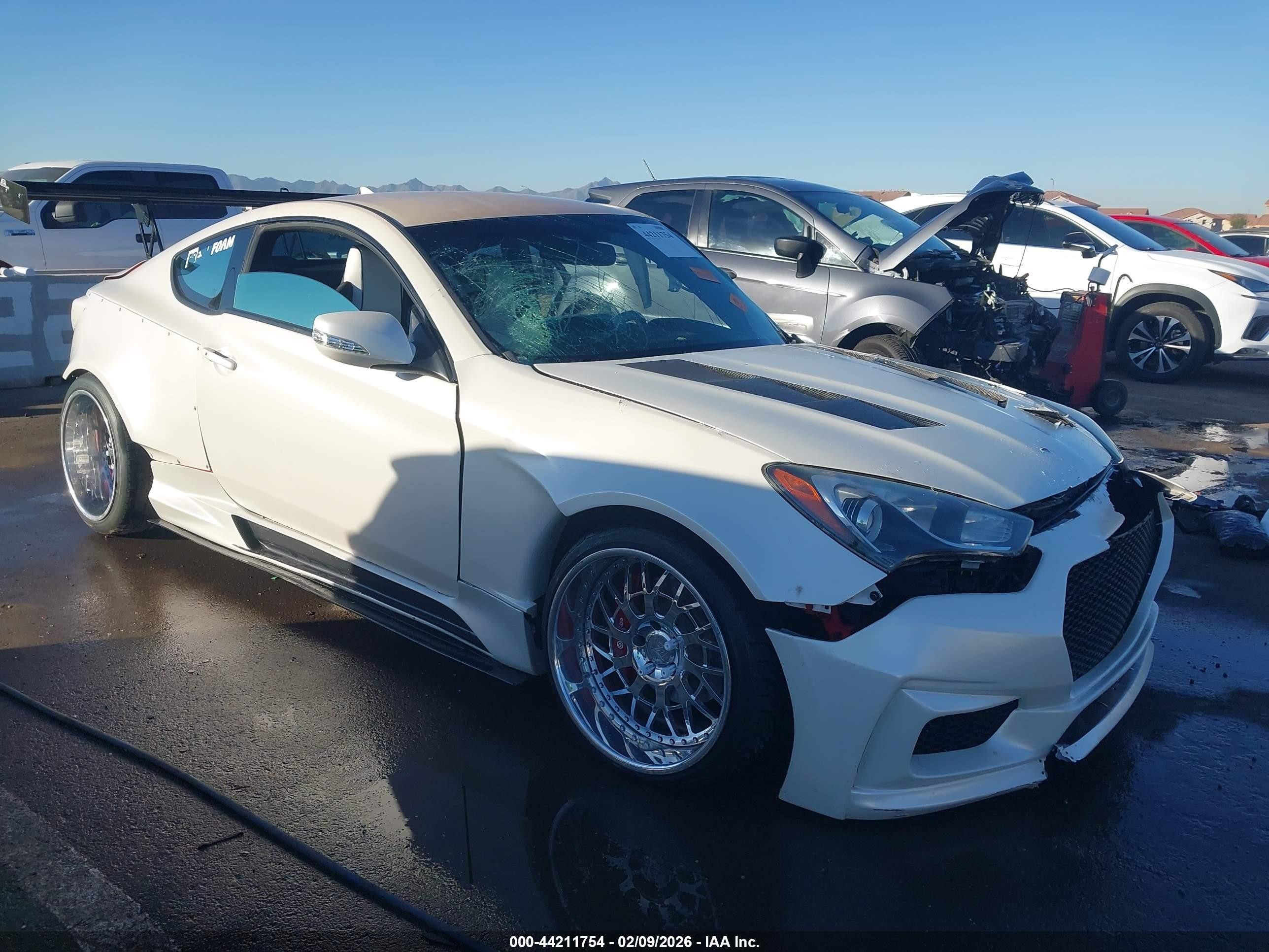 2015 Hyundai Genesis Coupe Ultimate, VIN KMHHU6KJ4FU127573 — Side