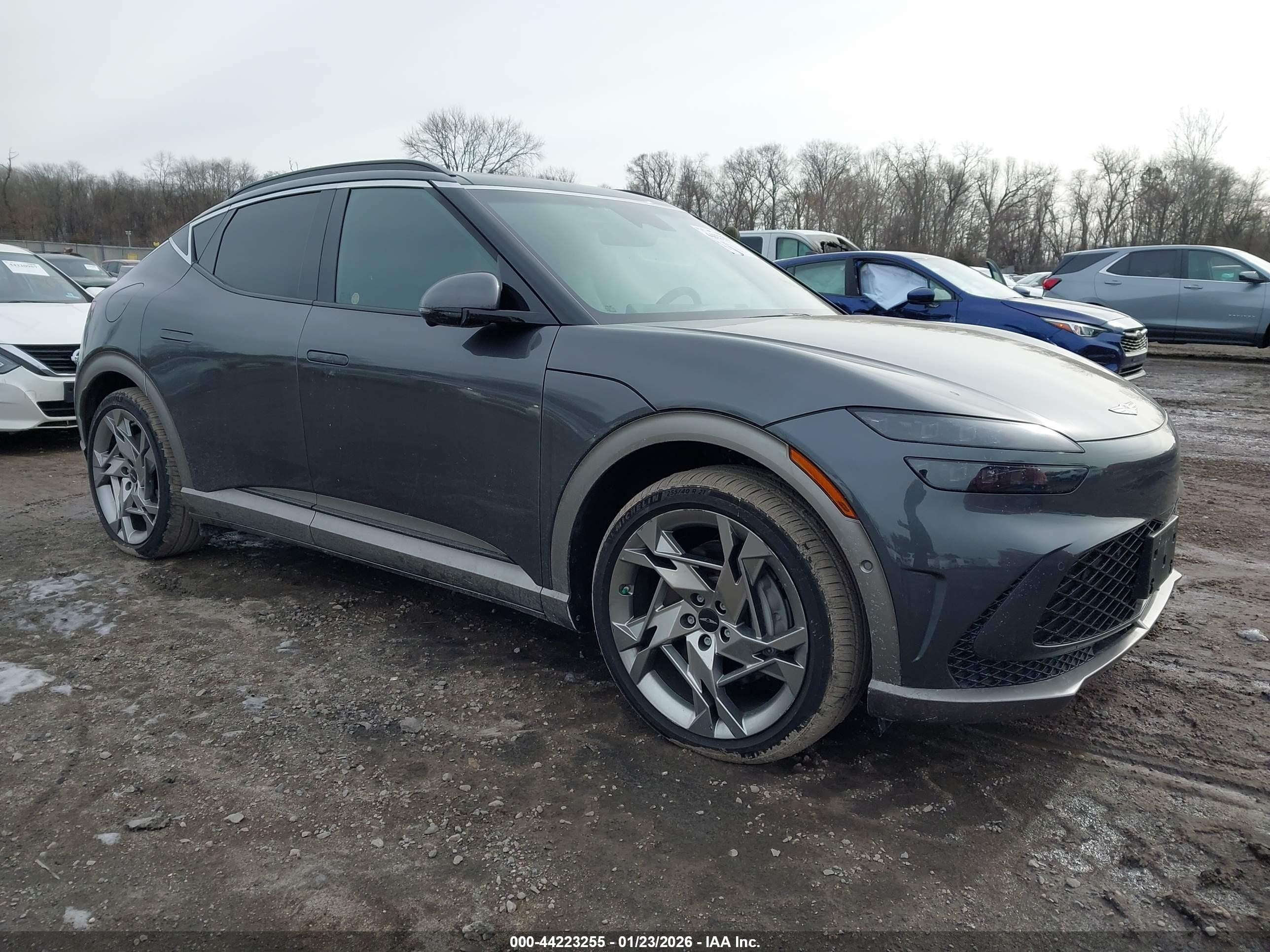 2023 Genesis GV60 Performance, VIN KMUKEDTB6PU009302 — Side