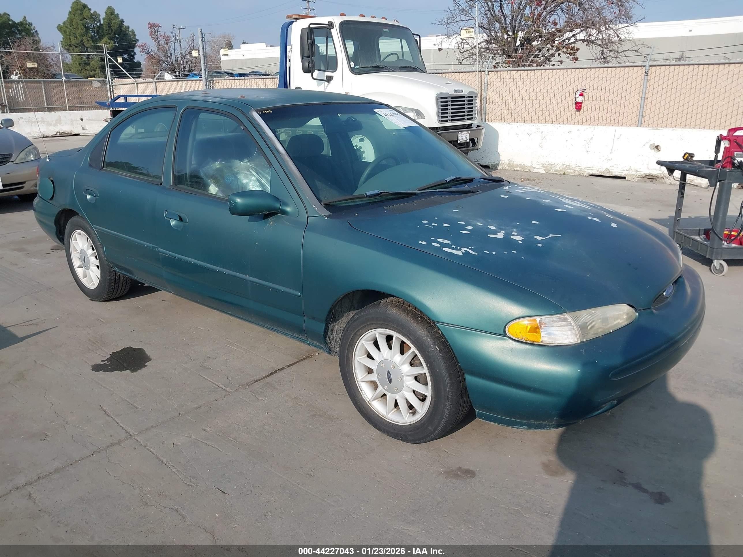 1996 Ford Contour GL, VIN 1FALP6531TK154472 — Side