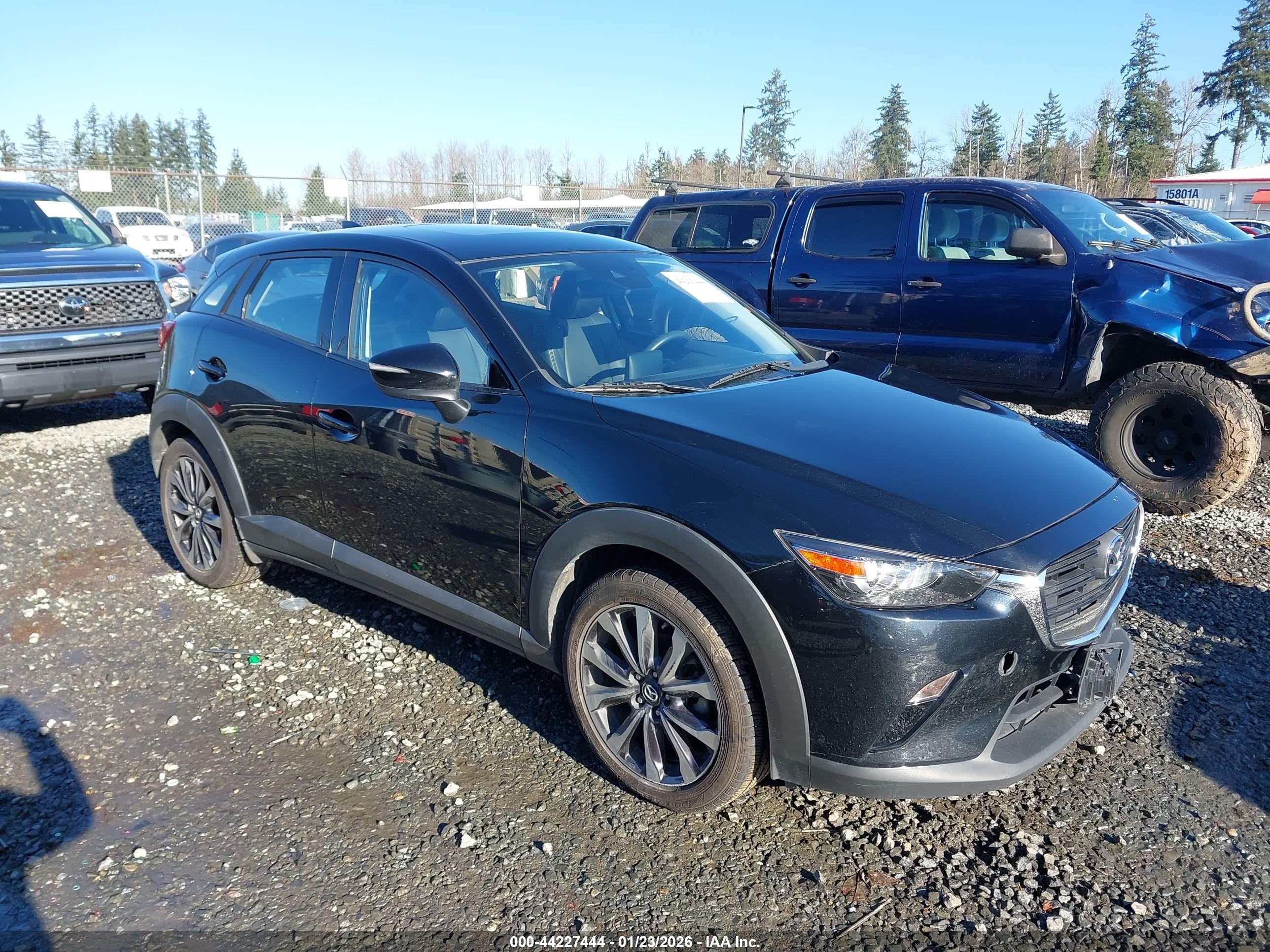 2019 Mazda CX-3 Touring, VIN JM1DKFC76K0453274 — Rear end