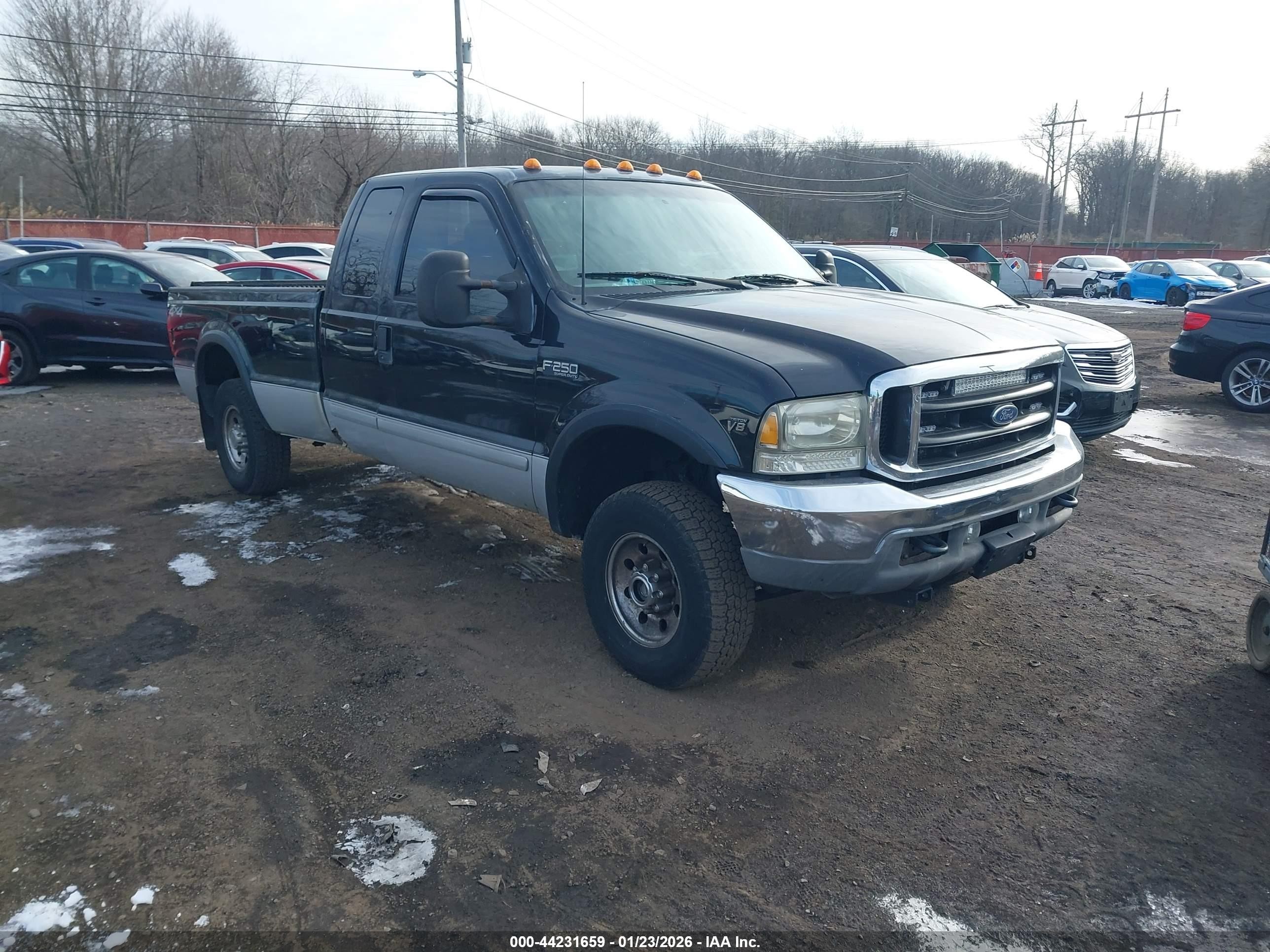 2002 Ford F-250 XL, VIN 1FTNX21L32EC75129 — Side