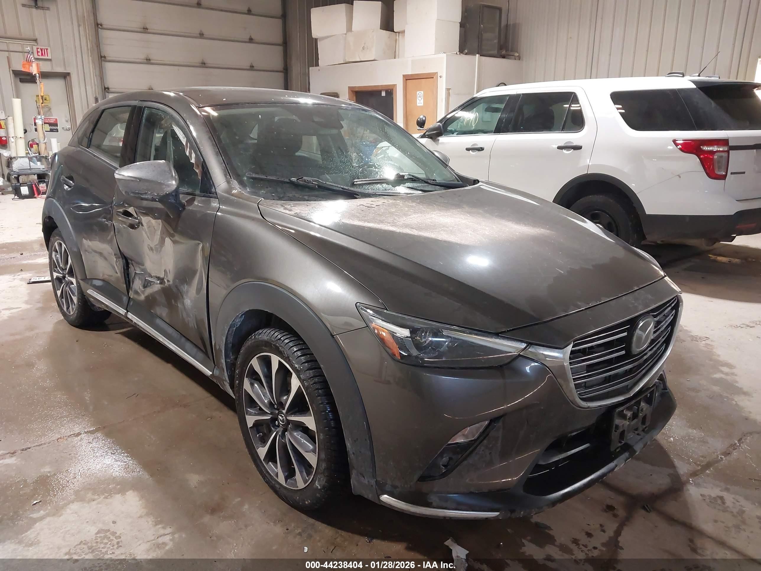2019 Mazda CX-3 Grand Touring, VIN JM1DKFD73K0453649 — Side