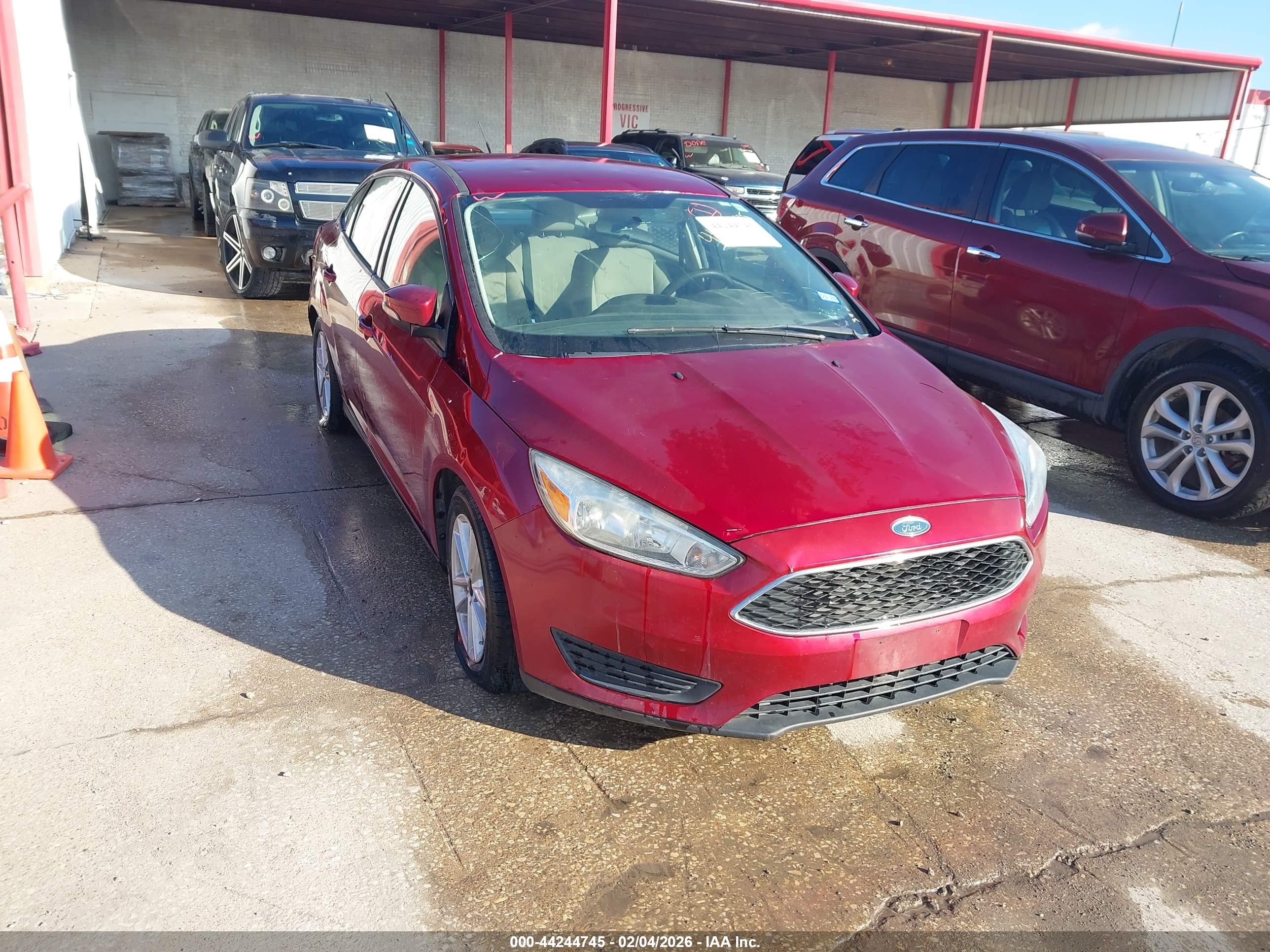 2016 Ford Focus SE, VIN 1FADP3F25GL389675 — Hail