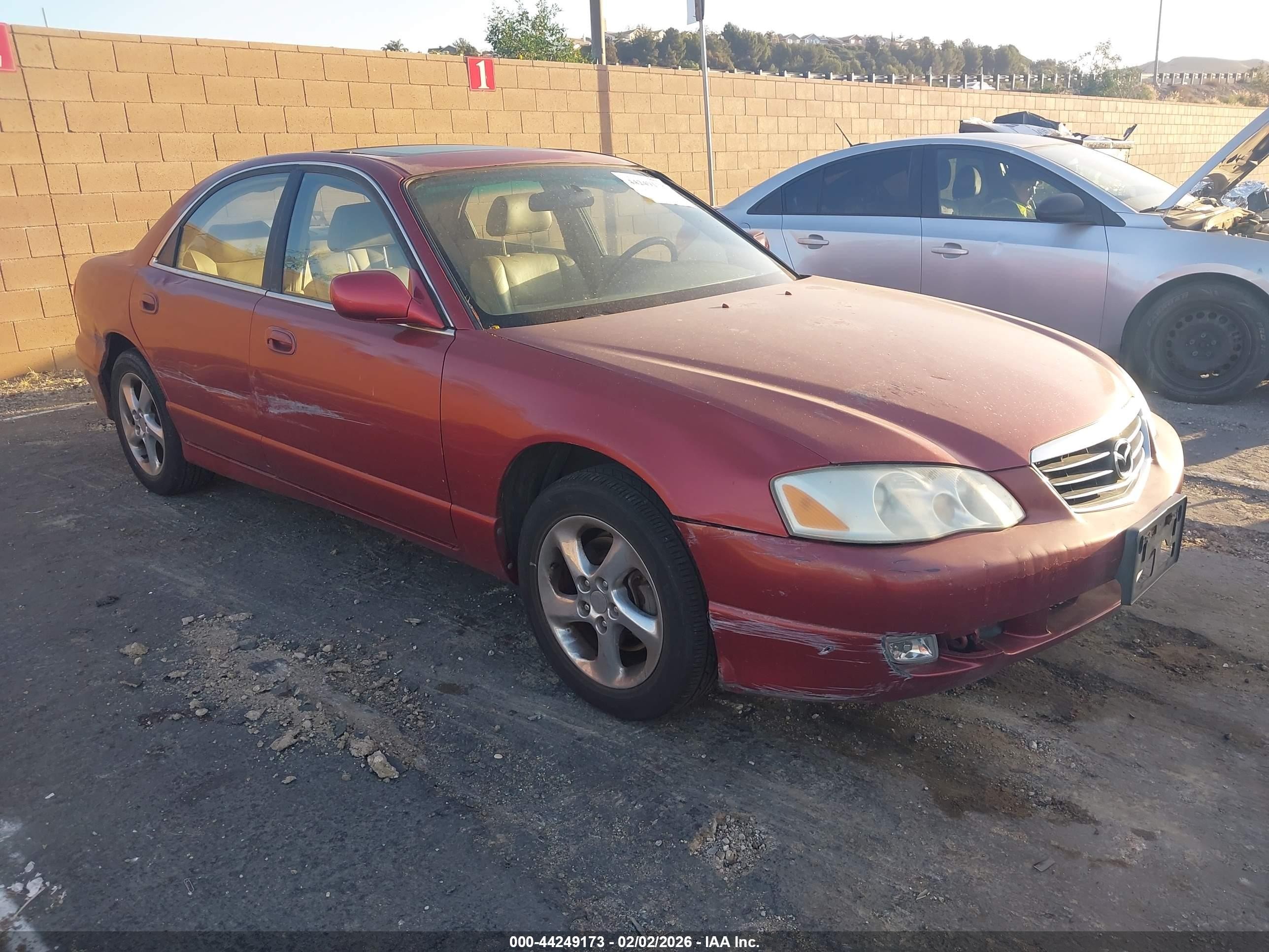 2002 Mazda Millenia P, VIN JM1TA221421723682 — Side