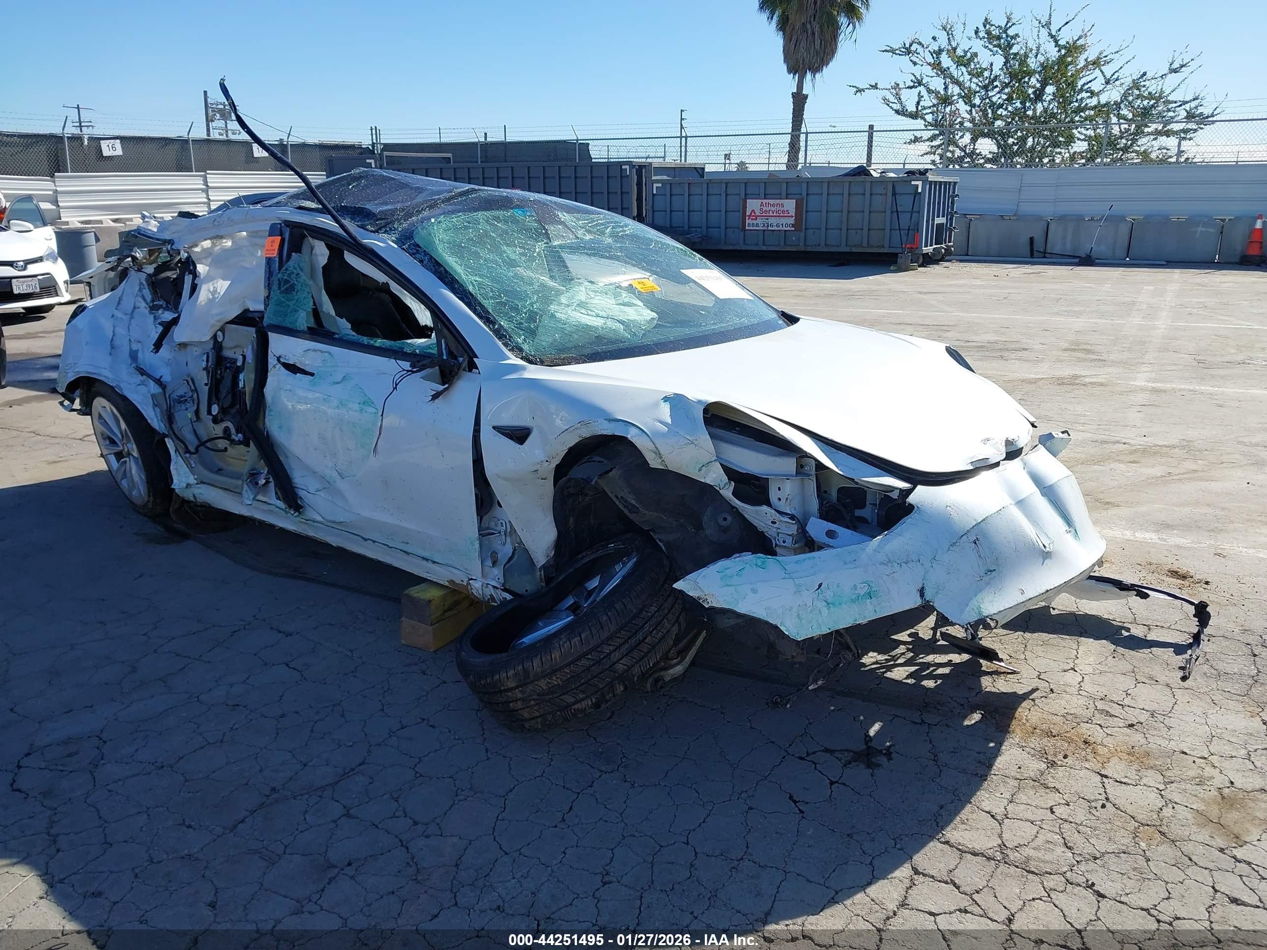 2021 Tesla Model 3 Standard Range Plus, VIN 5YJ3E1EA1MF018052 — Rollover