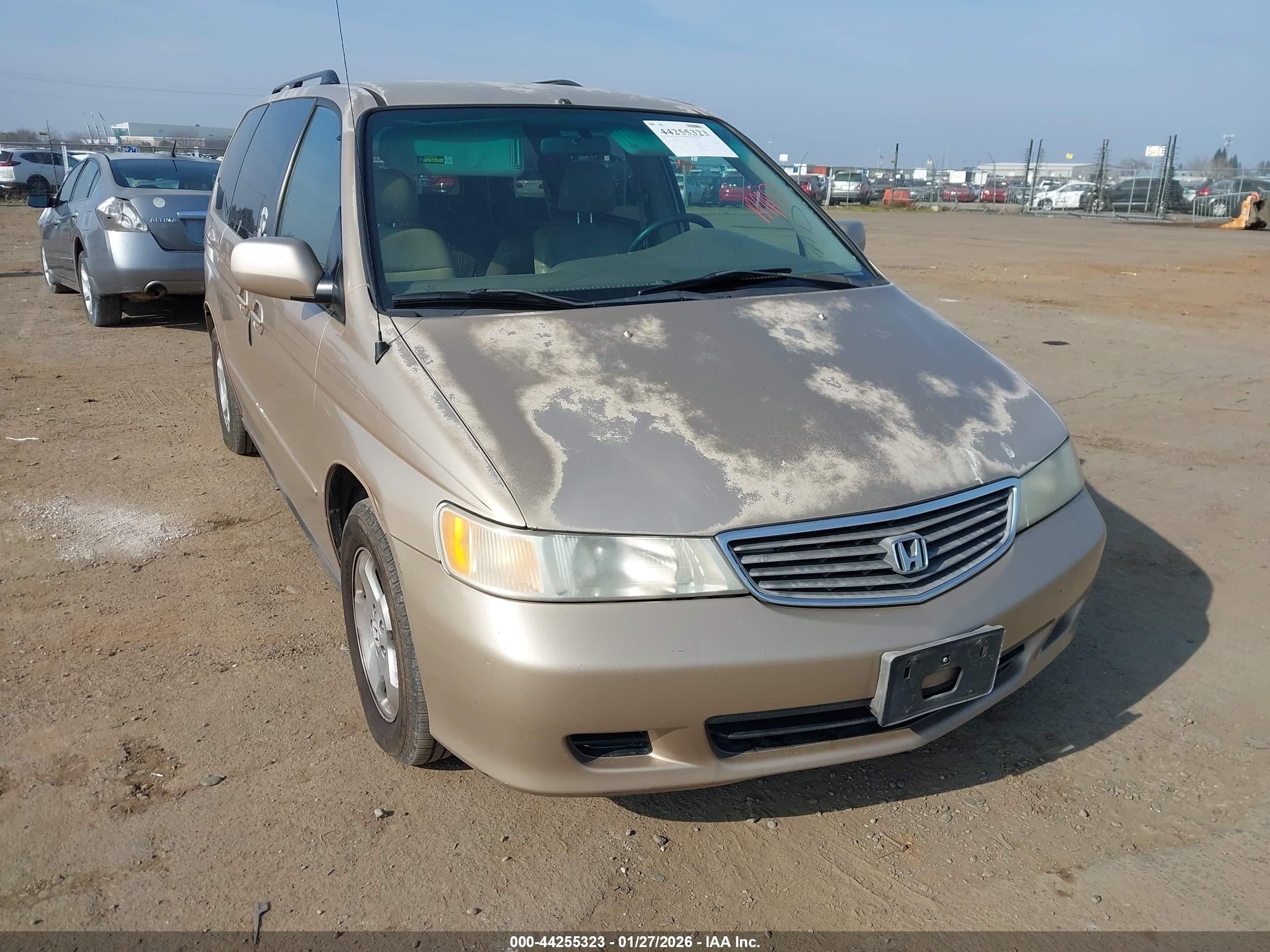 1999 Honda Odyssey EX, VIN 2HKRL1862XH511641 — Front end