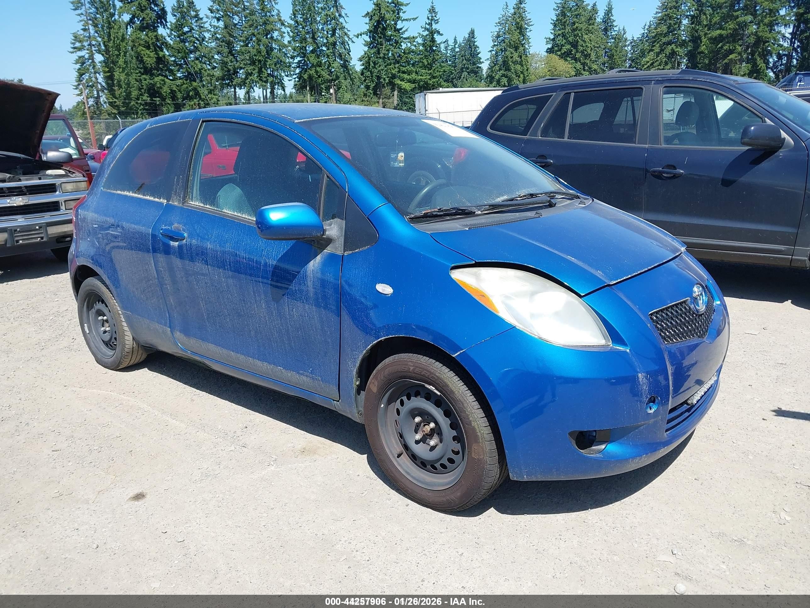 2007 Toyota Yaris, VIN JTDJT903475106281 — Бок