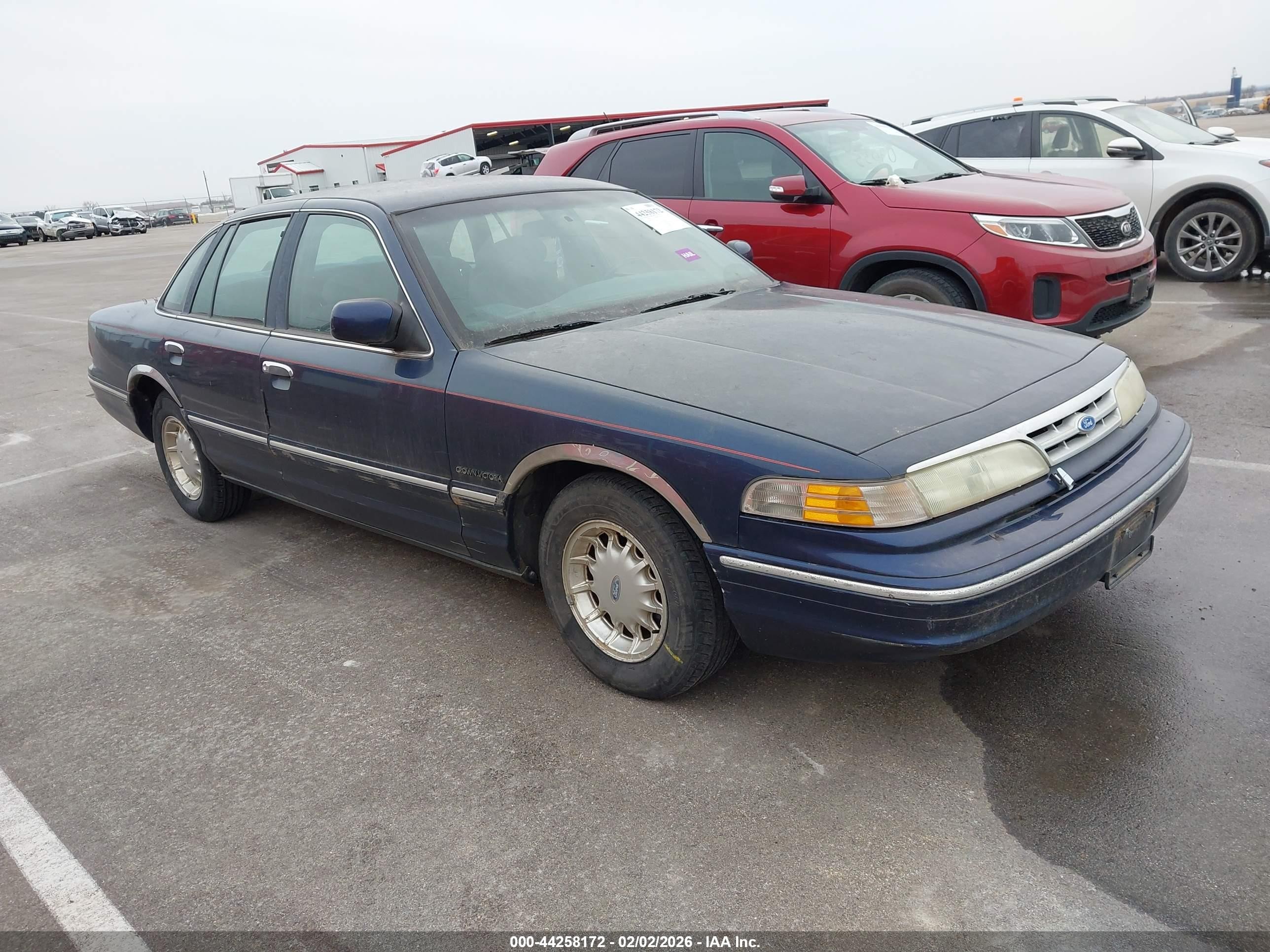 1995 Ford Crown Victoria LX, VIN 2FALP74W7SX143991 — Hail