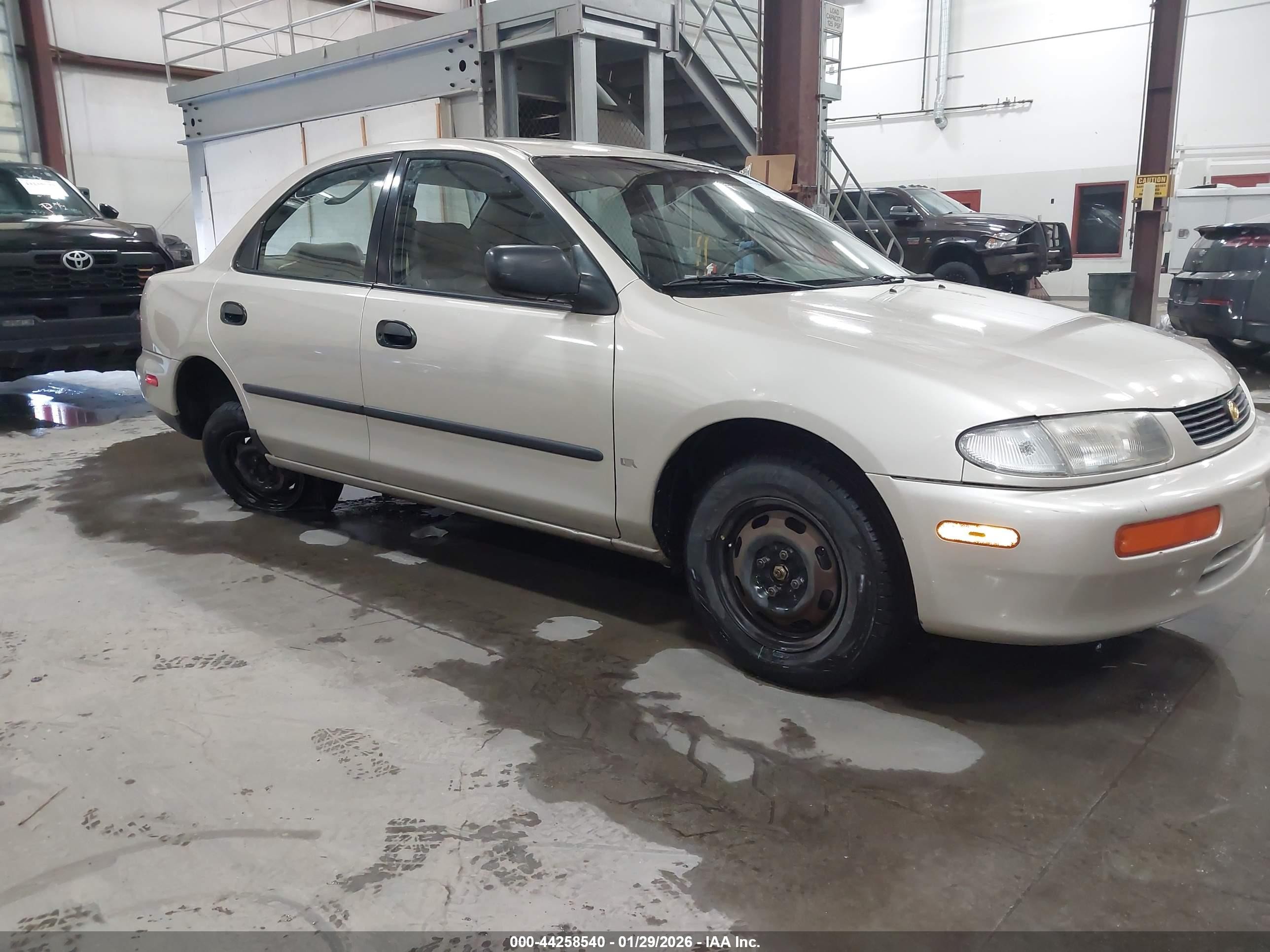 1996 Mazda Protege DX, VIN JM1BB1411T0334828 — Днище