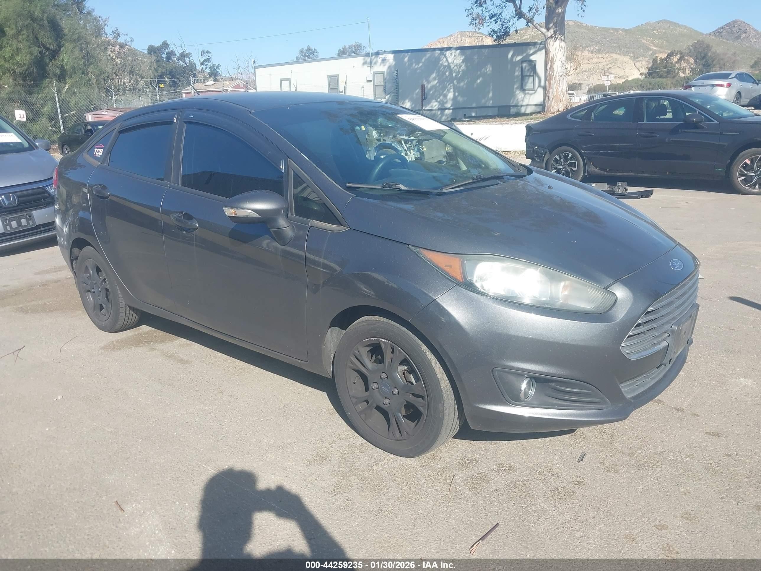 2015 Ford Fiesta SE, VIN 3FADP4BJ5FM161871 — Side