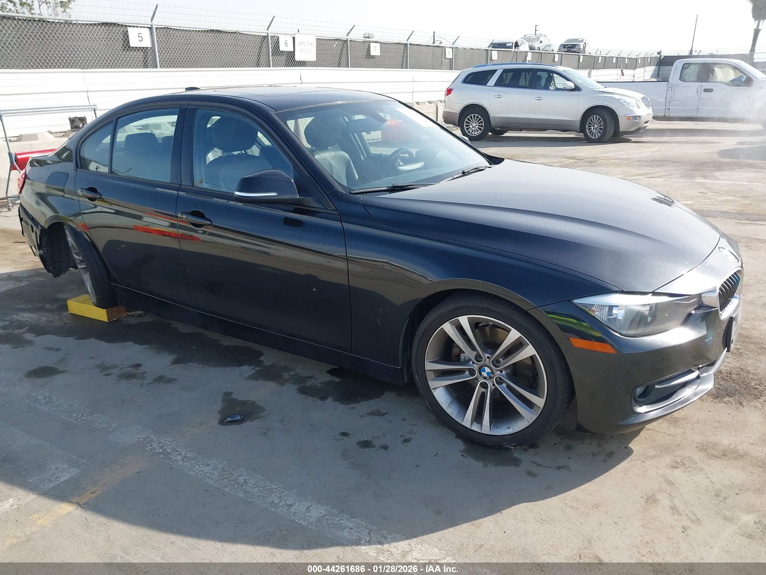 2014 BMW 3 Series 328d, VIN WBA3D3C56EK153615 — Rear end