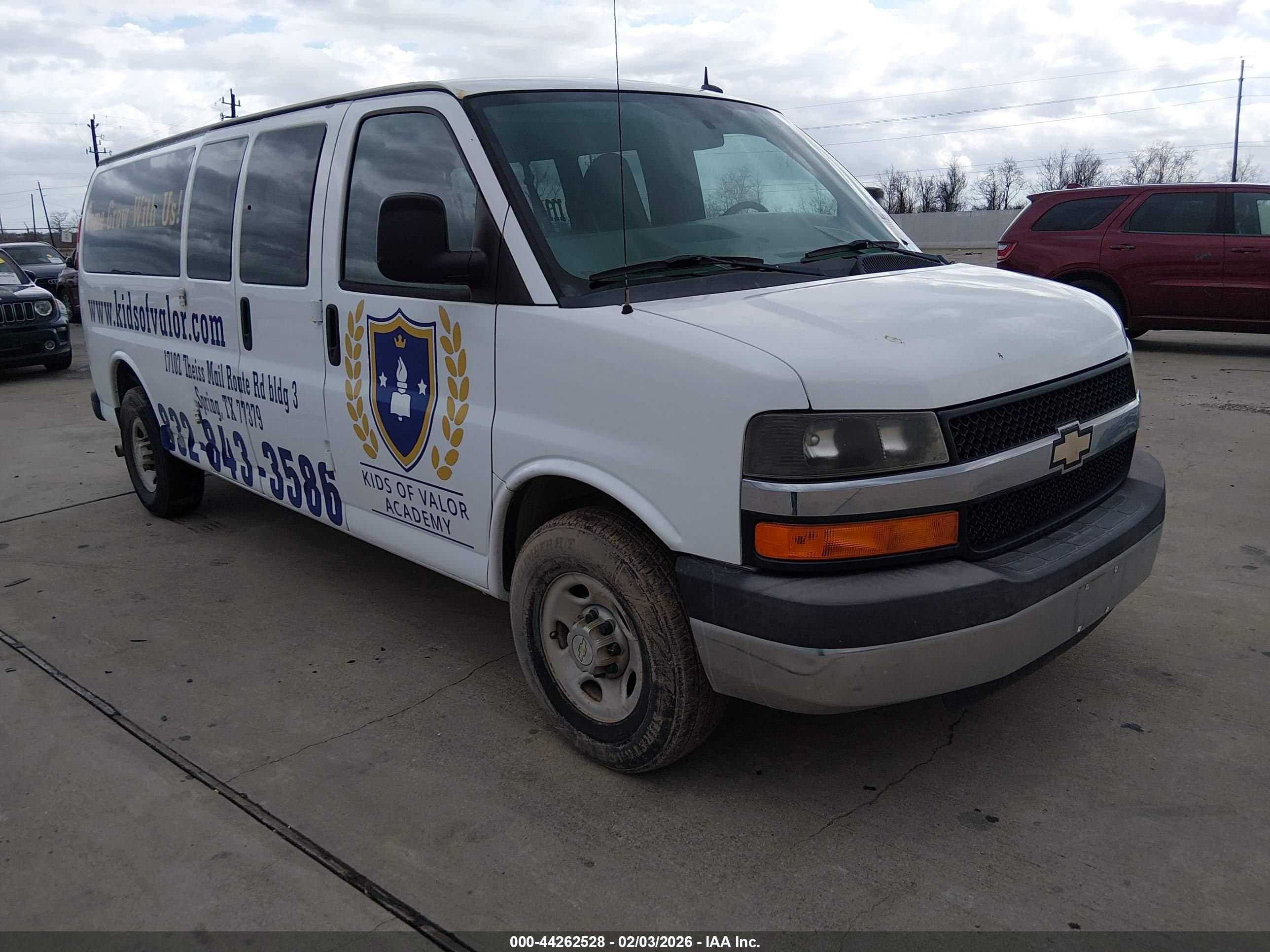 2013 Chevrolet Express Passenger LT, VIN 1GAZG1FG2D1151329 — Repossession