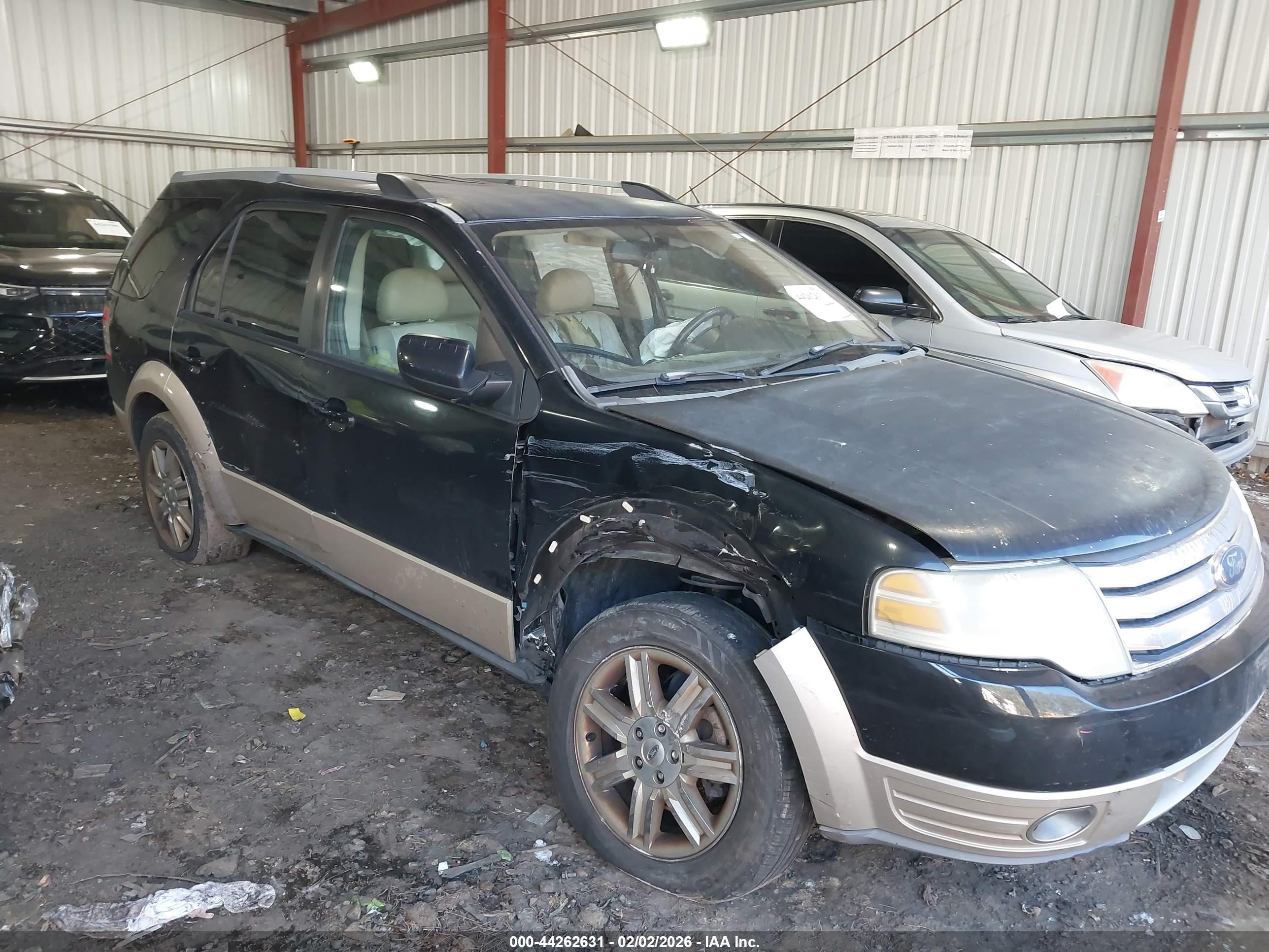 2009 Ford Taurus X Eddie Bauer, VIN 1FMDK07W49GA00010 — Side