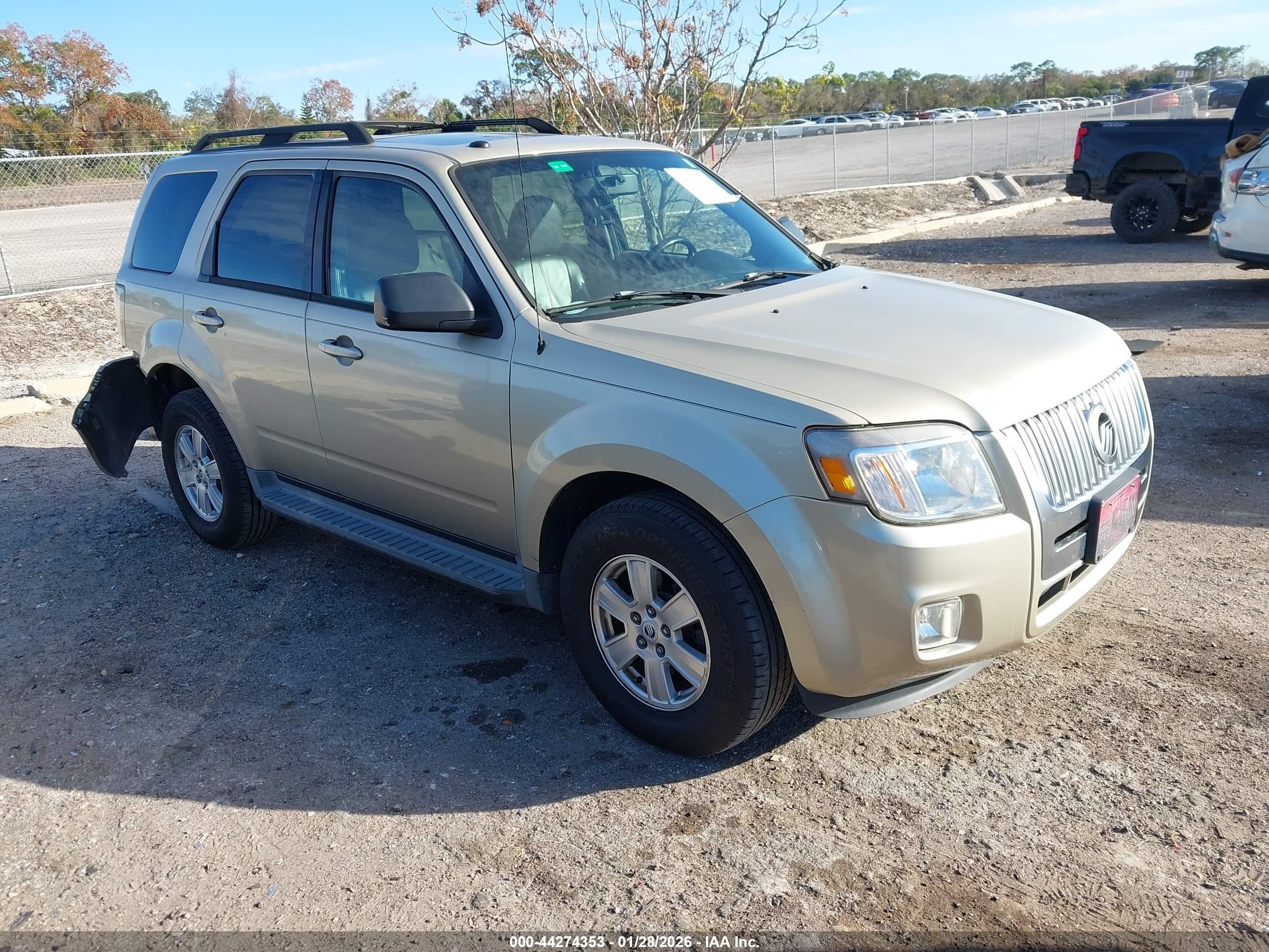 2011 Mercury Mariner, VIN 4M2CN8B76BKJ04002 — Rear end