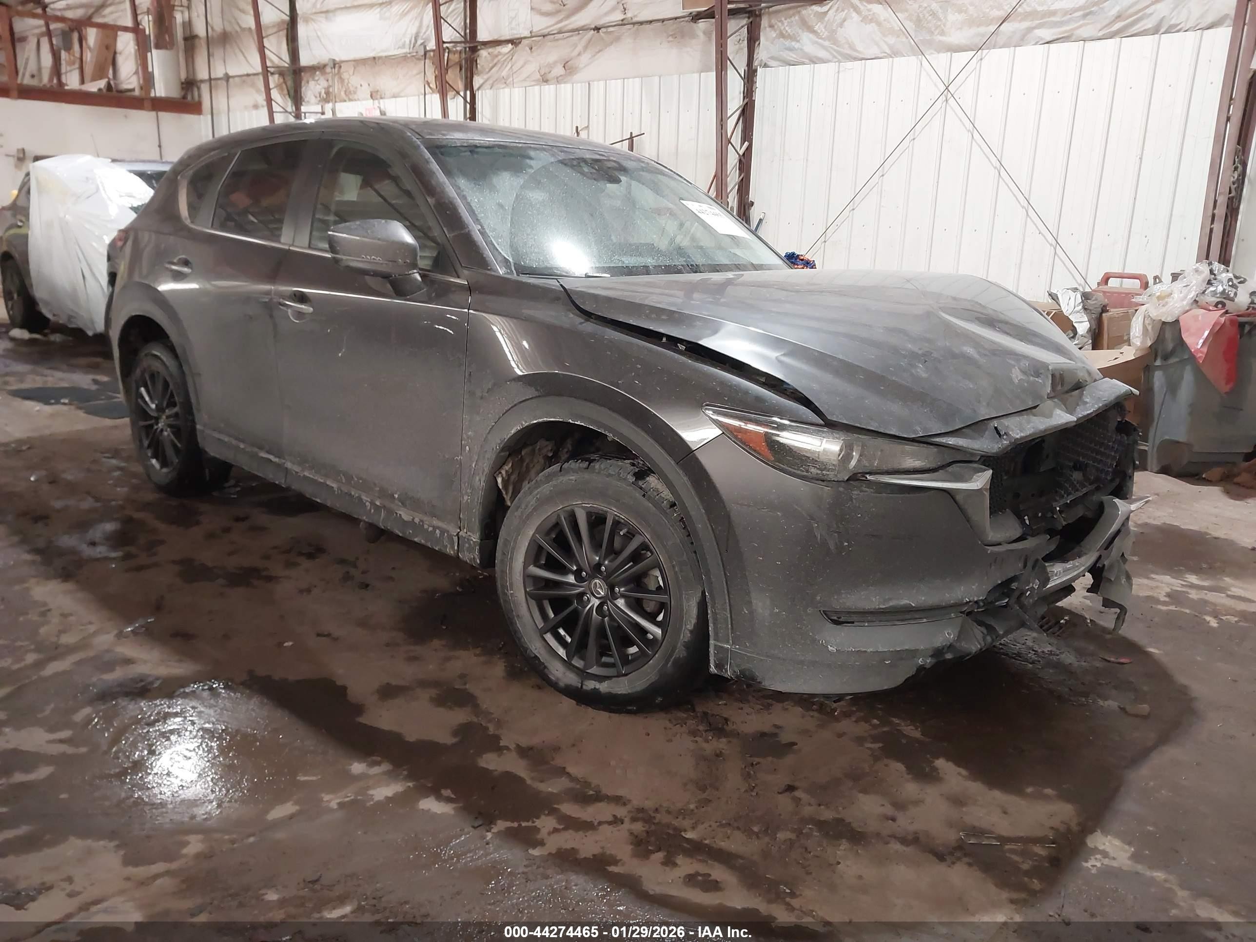 2021 Mazda CX-5 Touring, VIN JM3KFBCM5M1424833 — Front end