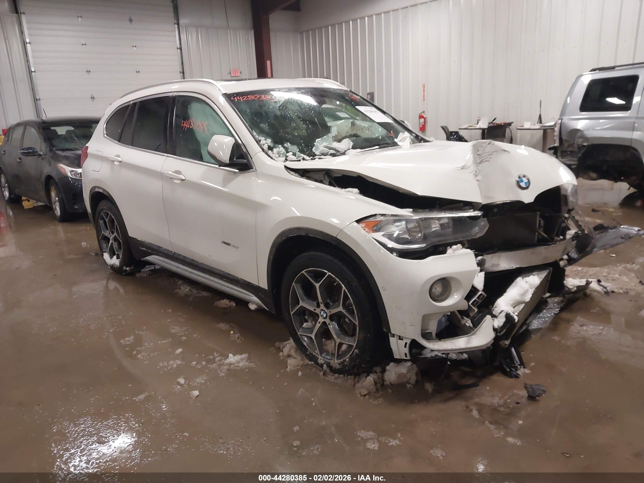 2016 BMW X1 xDrive28i, VIN WBXHT3C33GP888359 — Front end