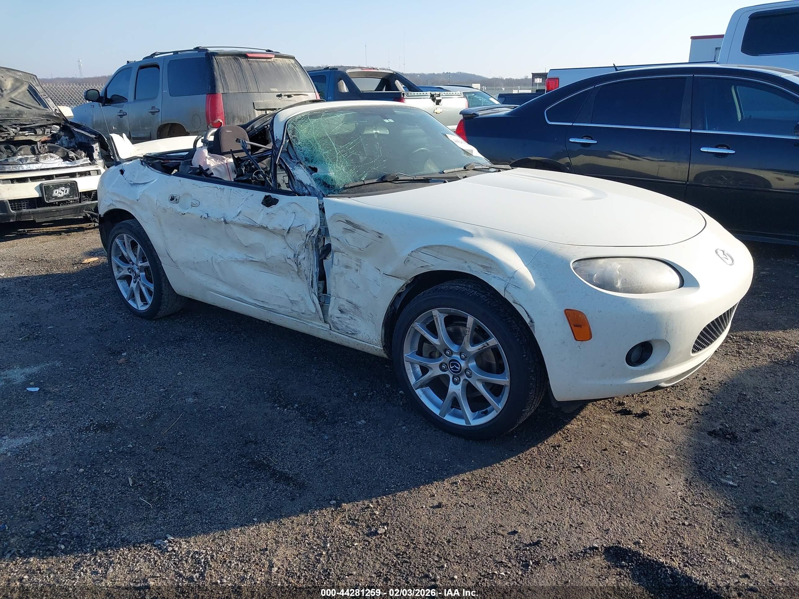 2006 Mazda MX-5 Miata Touring, VIN JM1NC25F160111199 — Side