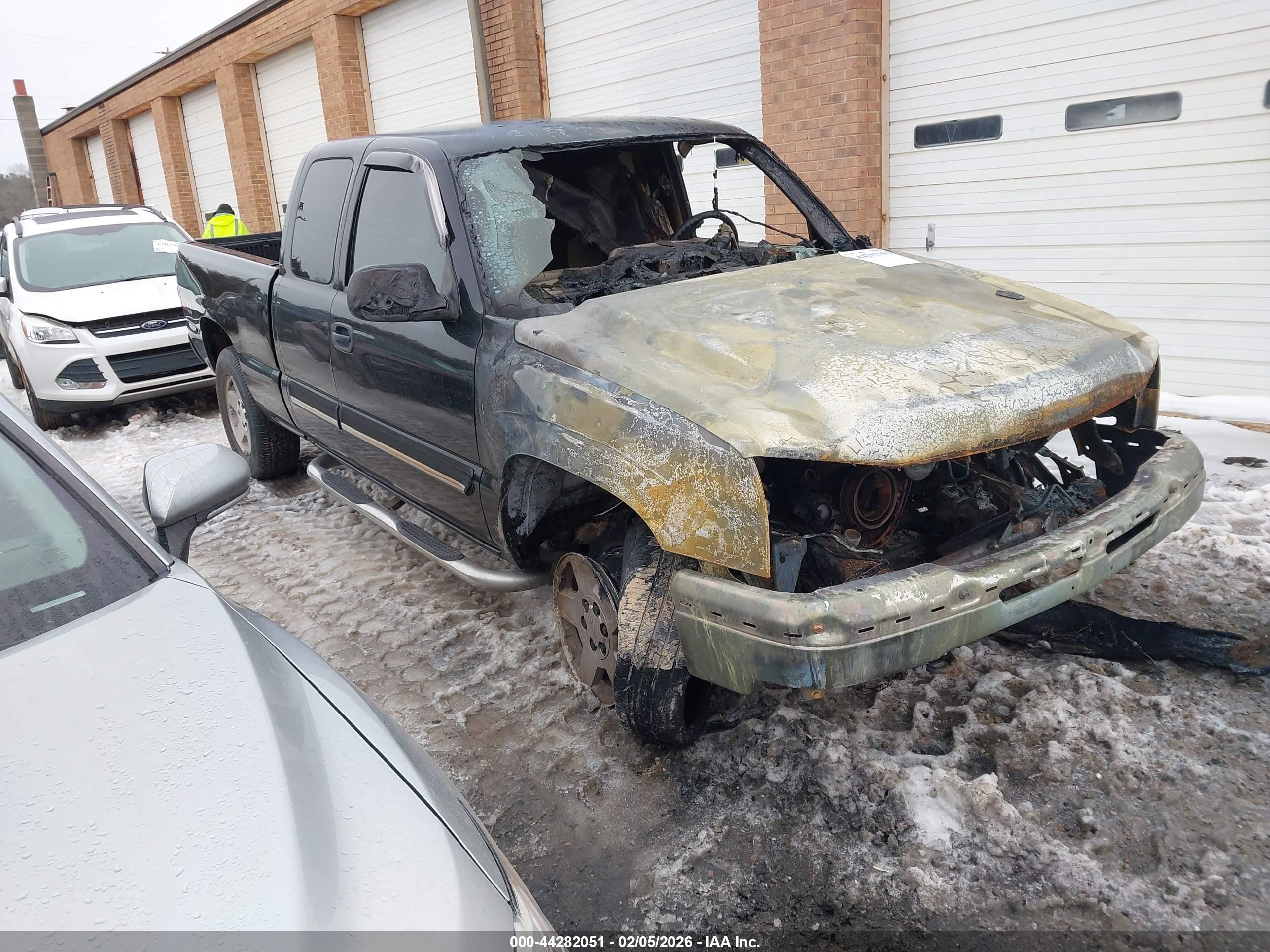 2007 Chevrolet Silverado 1500 Work Truck, VIN 1GCEK19V77Z150391 — Burn