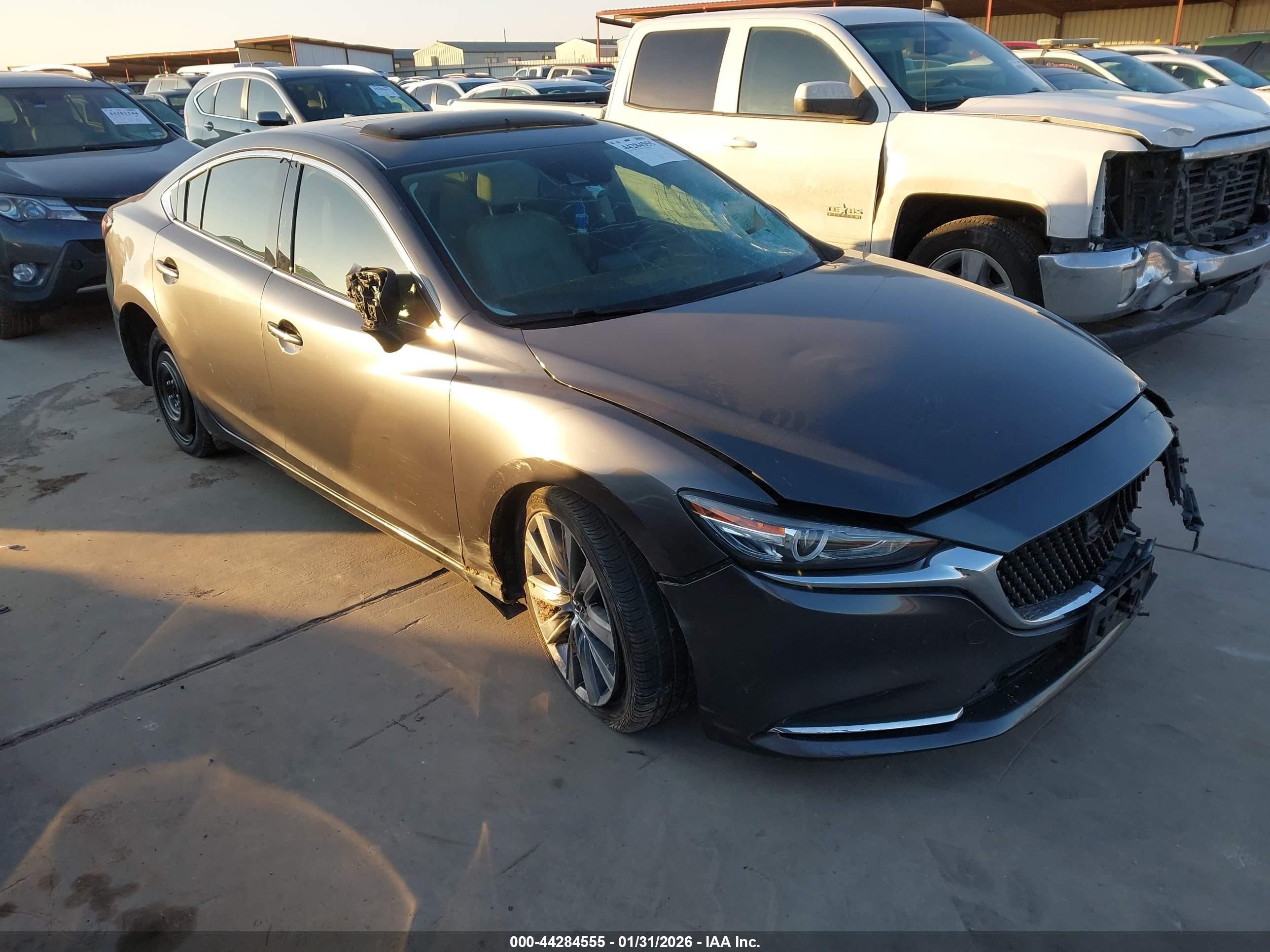 2018 Mazda 6 Grand Touring Reserve, VIN JM1GL1WY9J1300267 — Theft recovery