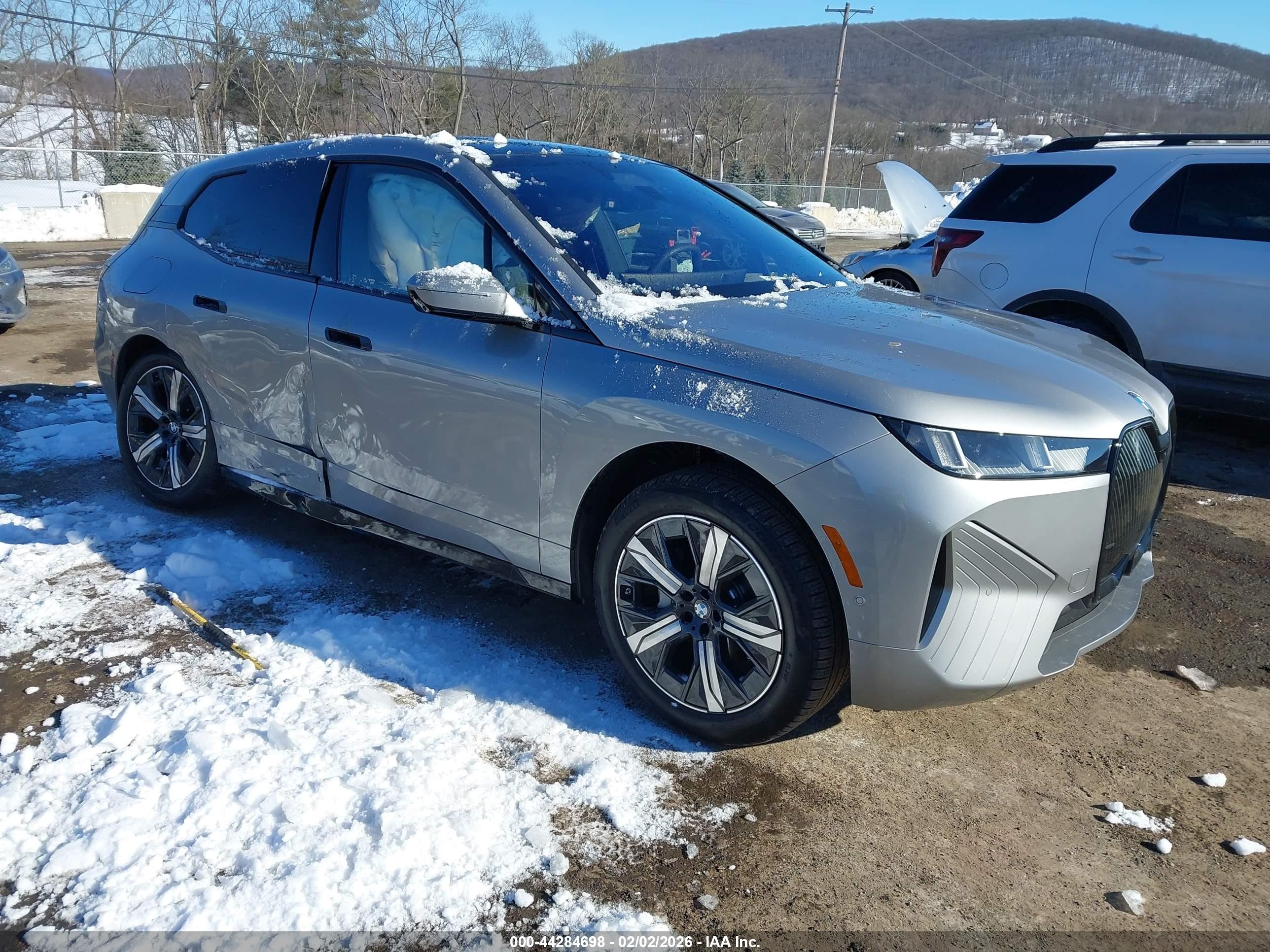2026 BMW iX xDrive45, VIN WB543CF04TCW81876 — Rear end
