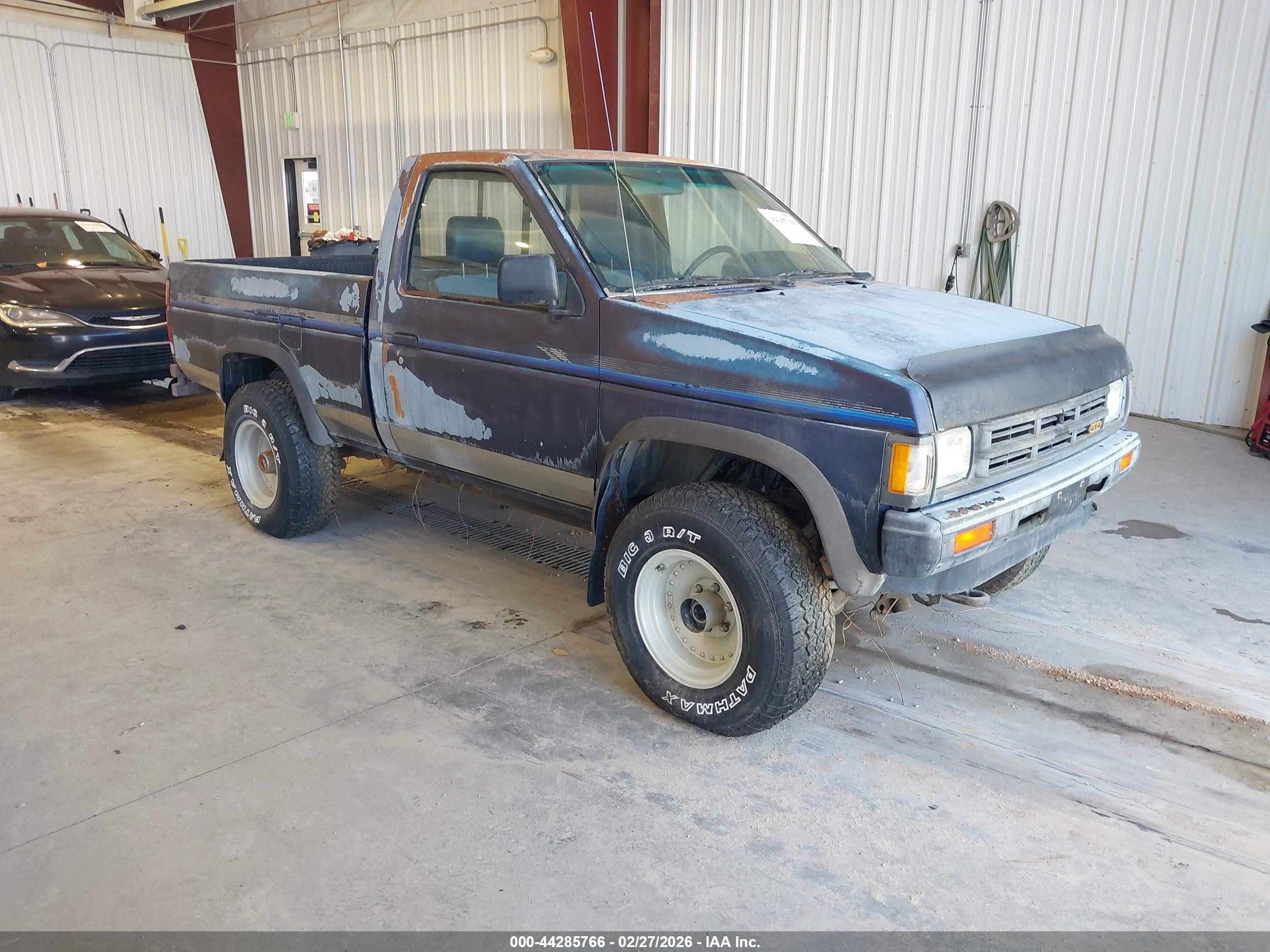 1991 Nissan Frontier XE, VIN 1N6SD11Y0MC316569 — Side