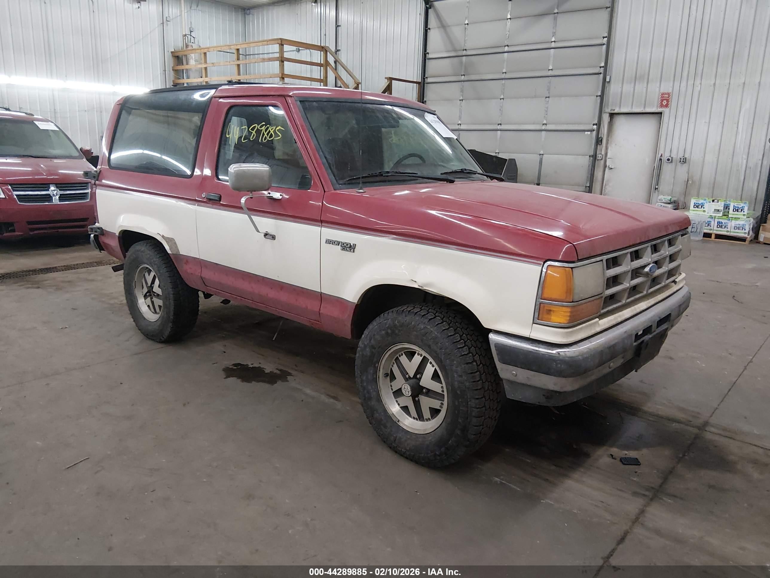 1990 Ford Bronco, VIN 1FMCU14T5LUA31023 — Side