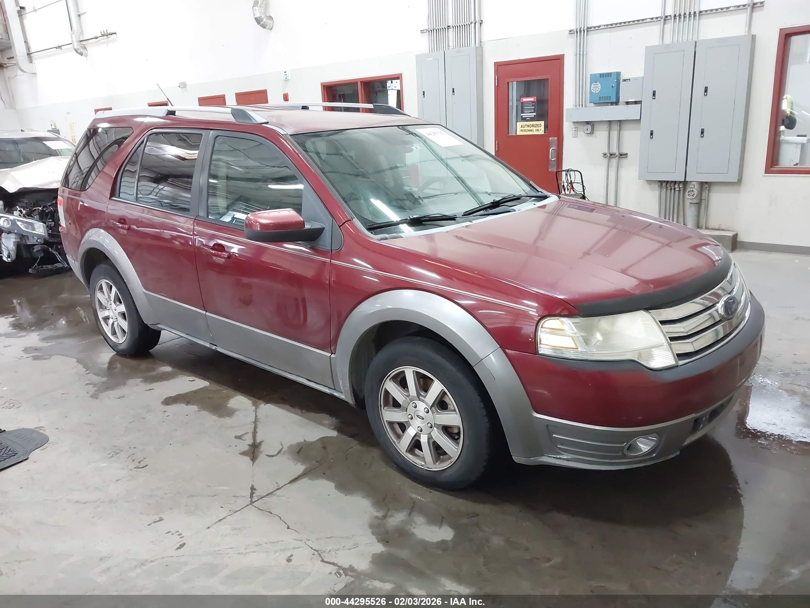 2008 Ford Taurus X SEL, VIN 1FMDK02W48GA27942 — Side
