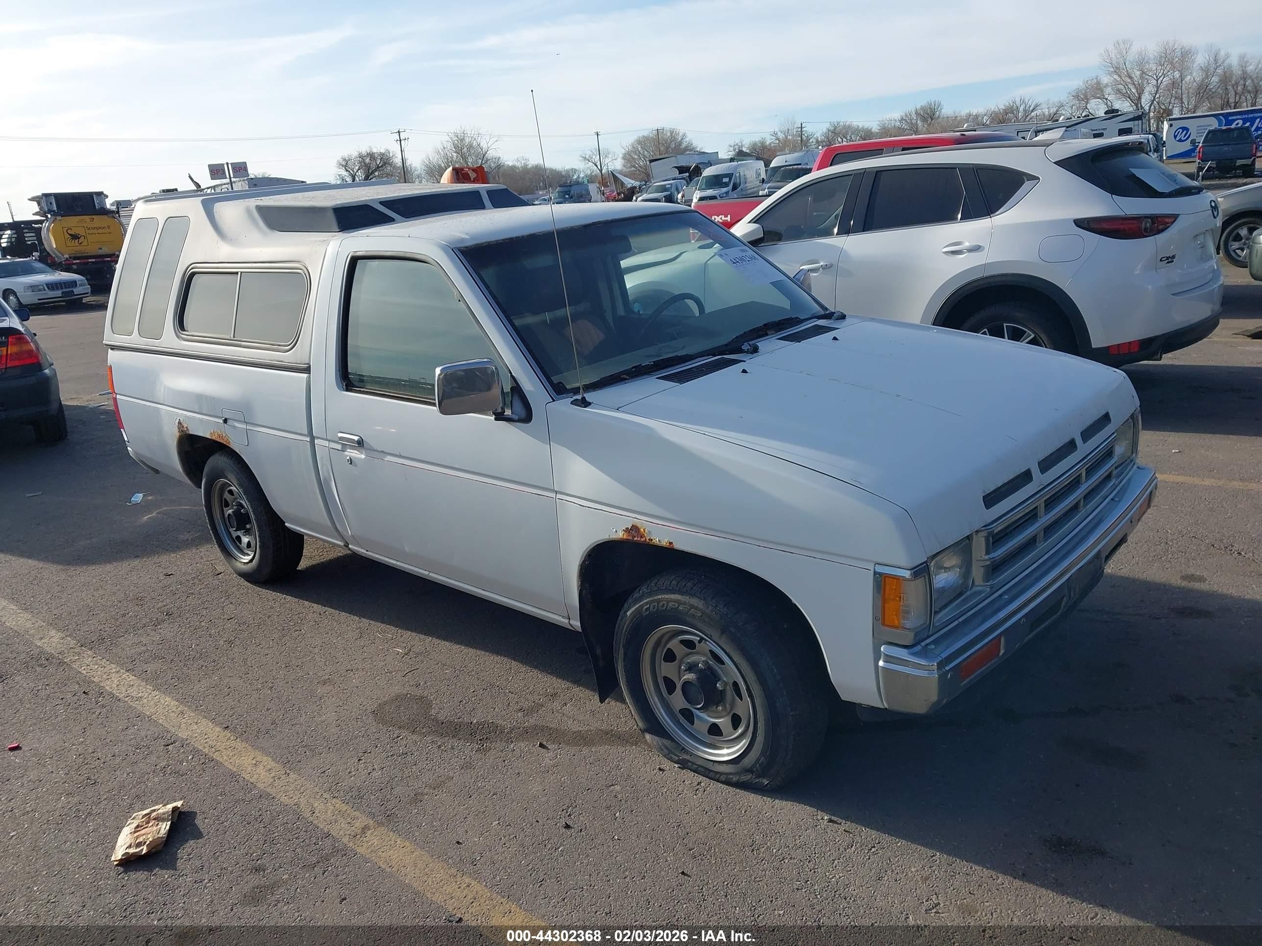 1992 Nissan Frontier XE, VIN 1N6SD11S0NC311529 — Side