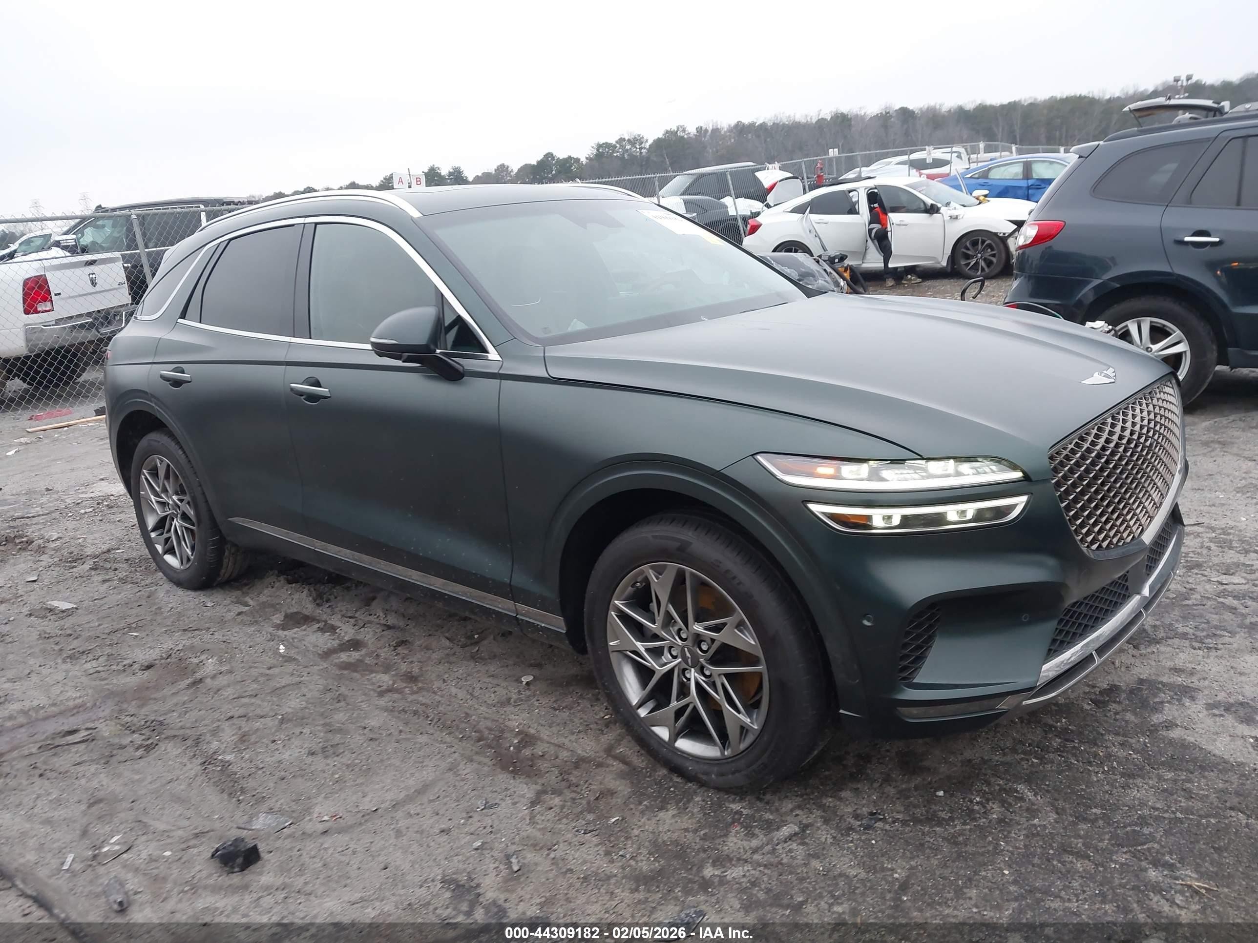 2022 Genesis GV70 2.5T, VIN KMUMADTB7NU066478 — Side