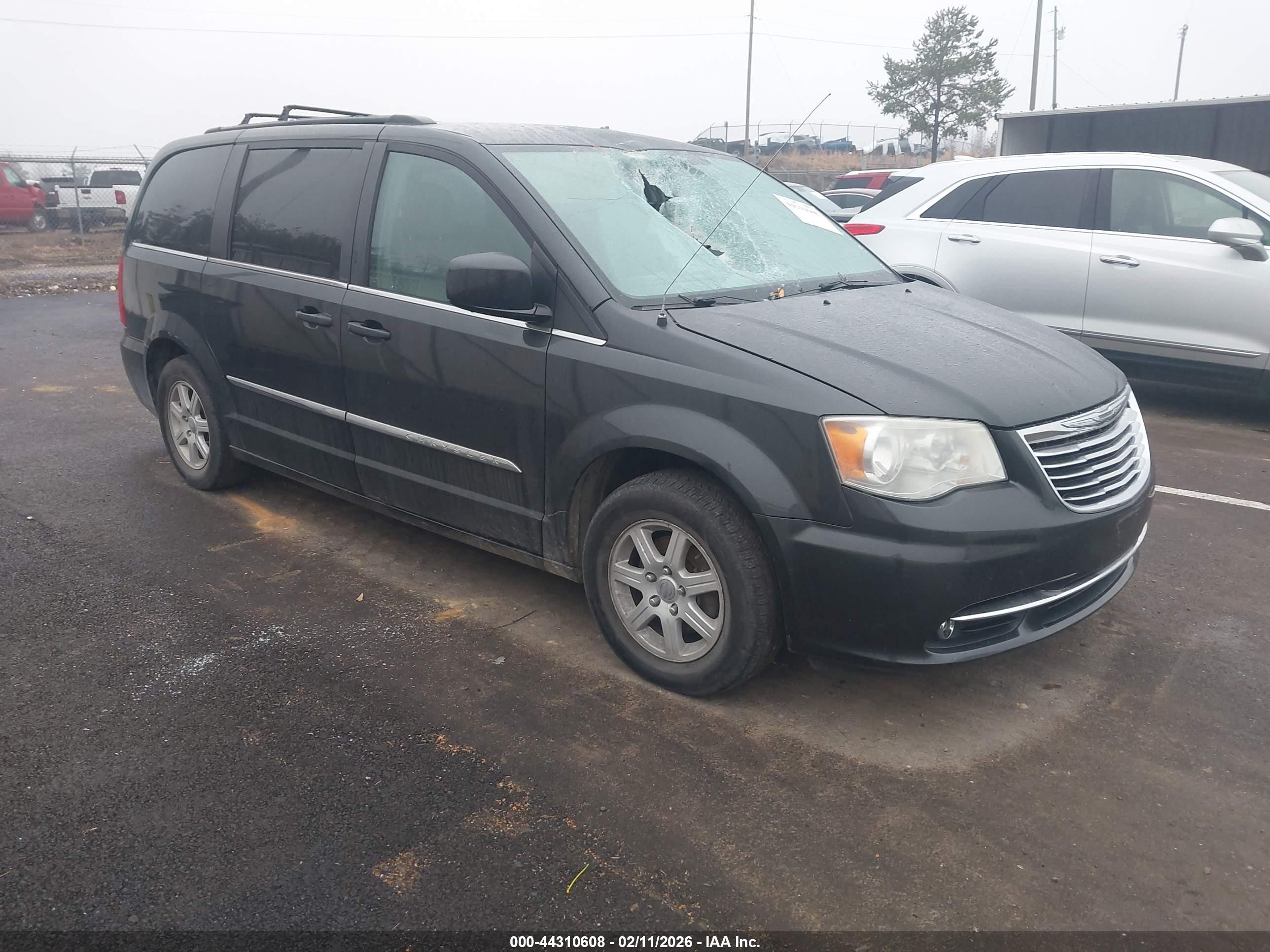 2011 Chrysler Town & Country Touring, VIN 2A4RR5DG2BR694677 — Storm