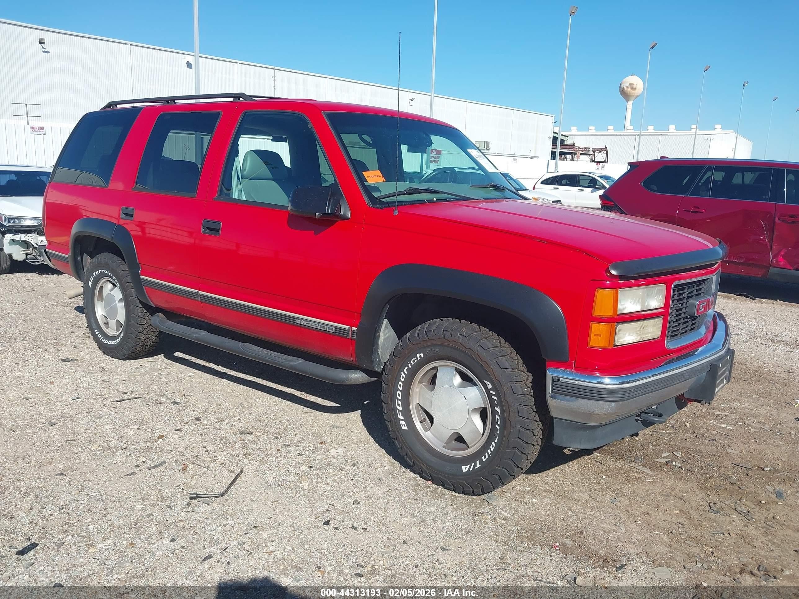 1999 GMC Denali, VIN 1GKEK13R4XR505906 — Rear end