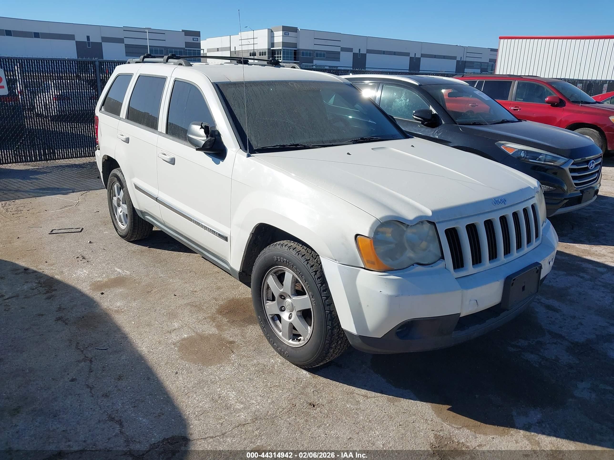 2010 Jeep Grand Cherokee Laredo, VIN 1J4PS4GK1AC111898 — Rear end