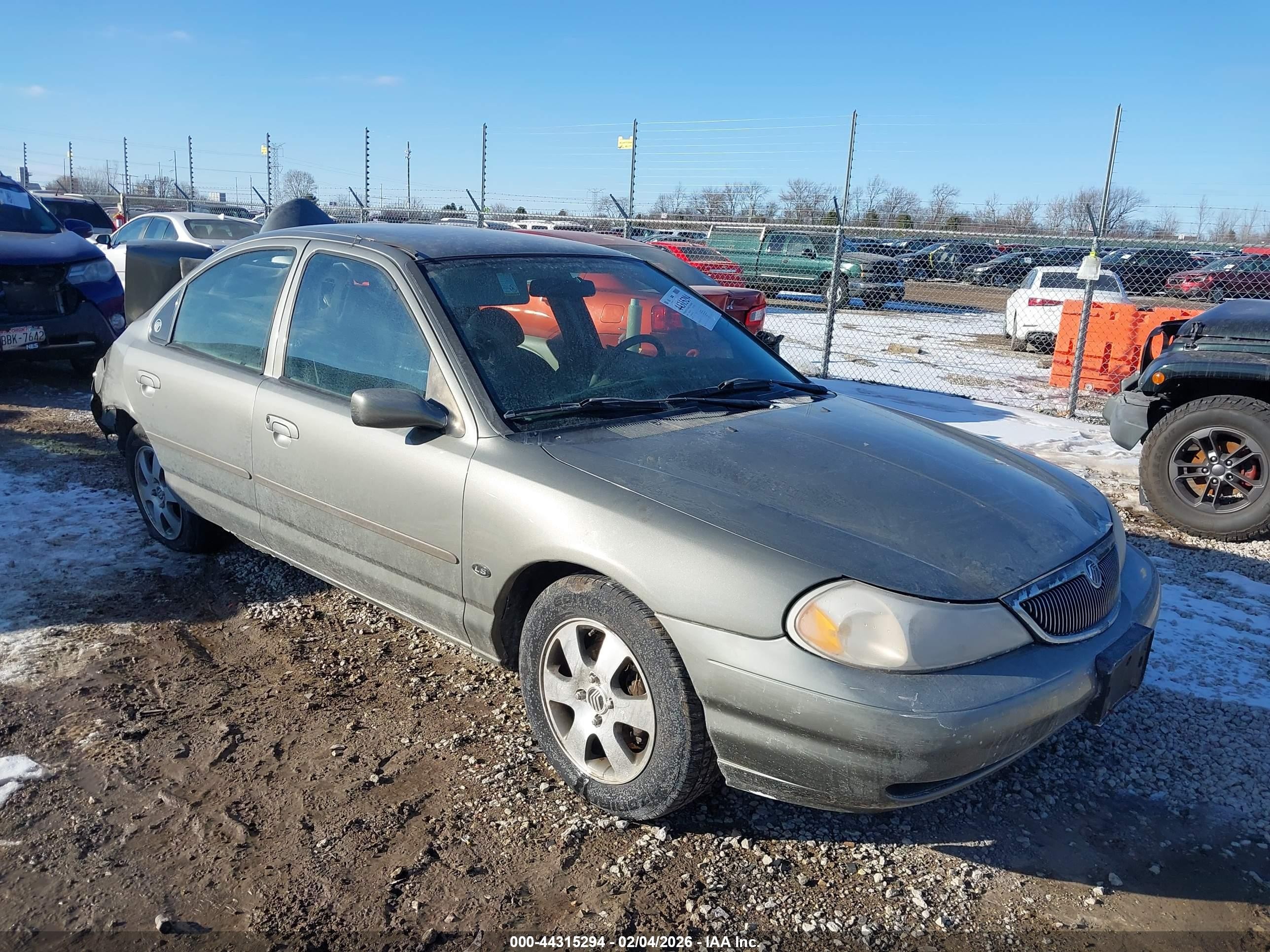 1999 Mercury Mystique, VIN 1MEFM66L9XK633547 — Rear end