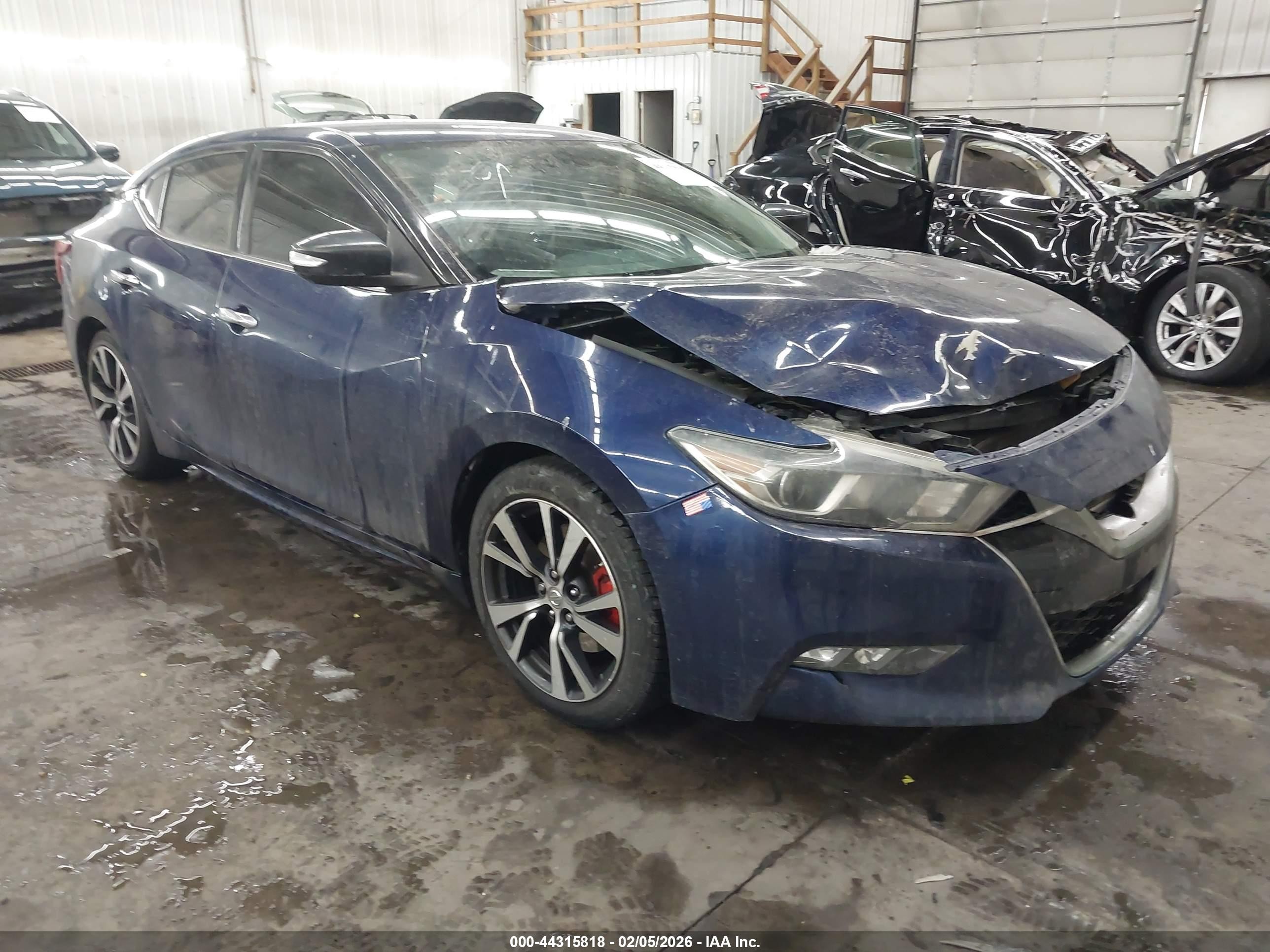 2017 Nissan Maxima Platinum, VIN 1N4AA6AP3HC365305 — Side