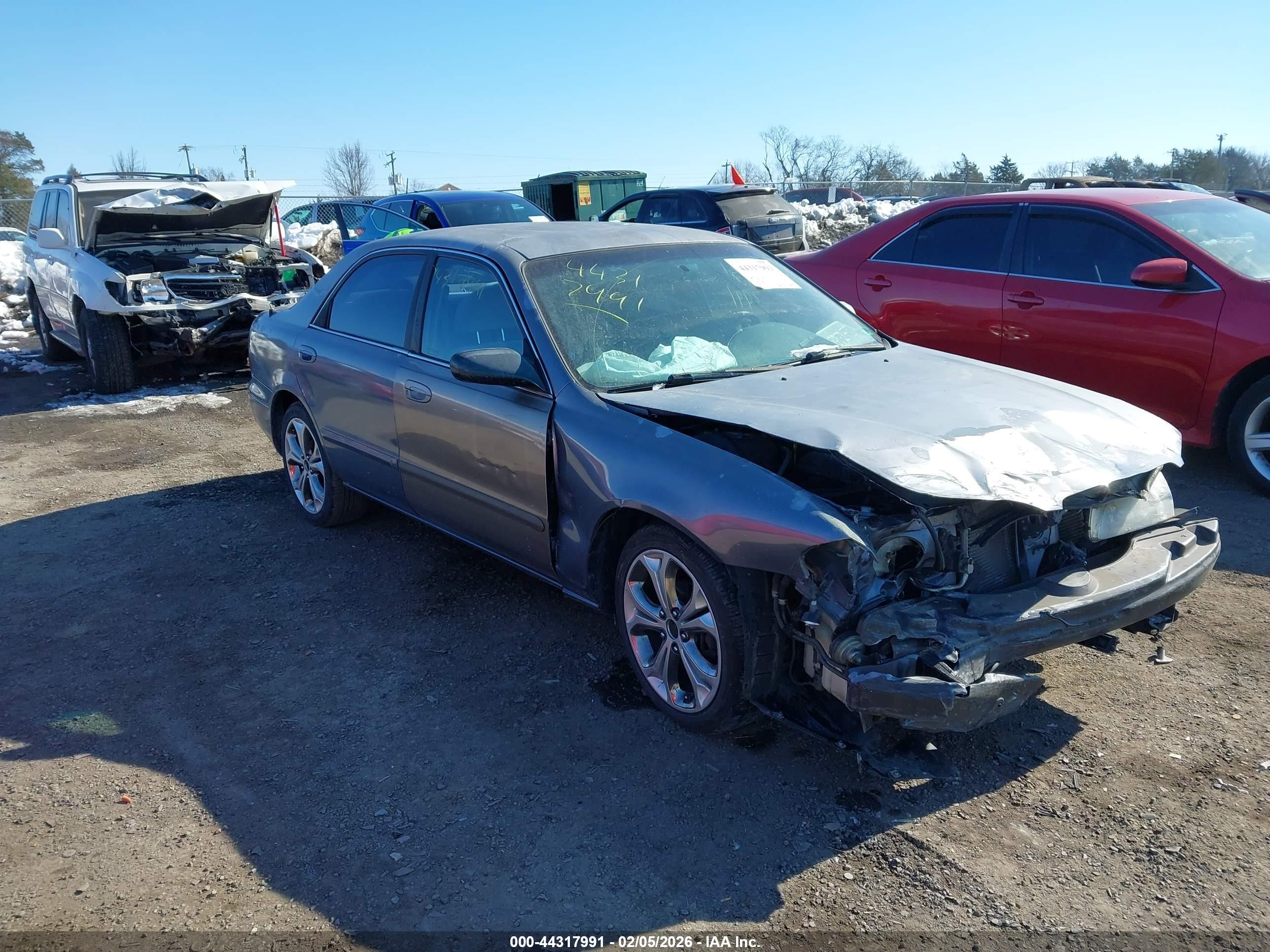 1998 Mazda 626 DX, VIN 1YVGF22C6W5698314 — Front end