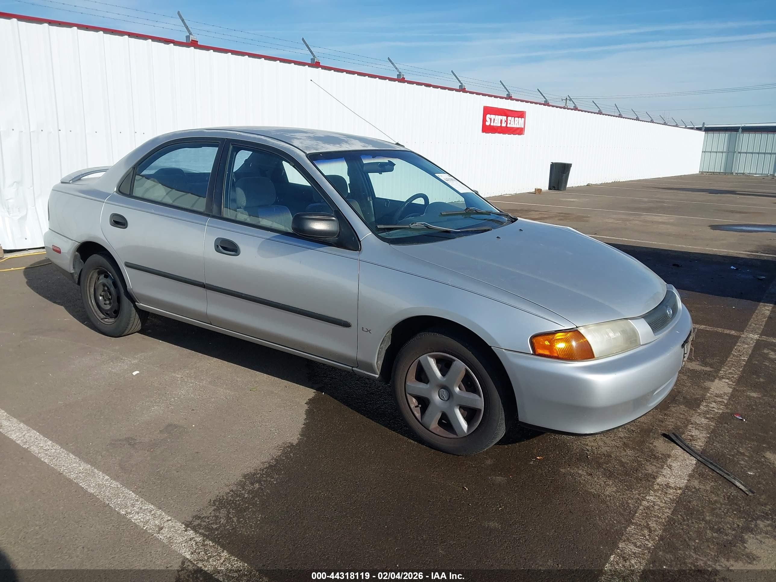 1998 Mazda Protege DX, VIN JM1BC1410W0197463 — Front end
