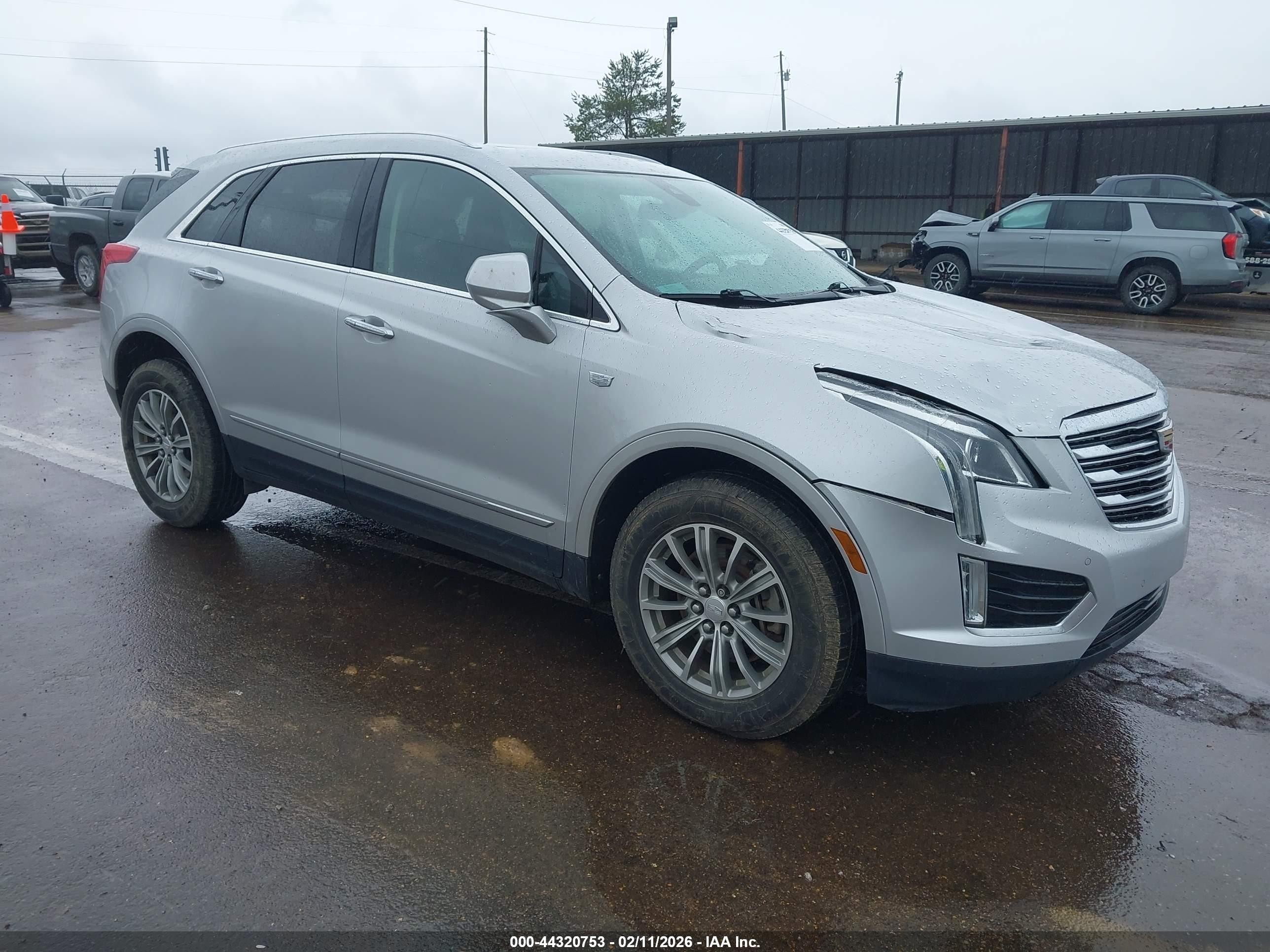 2018 Cadillac XT5 Luxury FWD, VIN 1GYKNCRSXJZ113977 — Storm