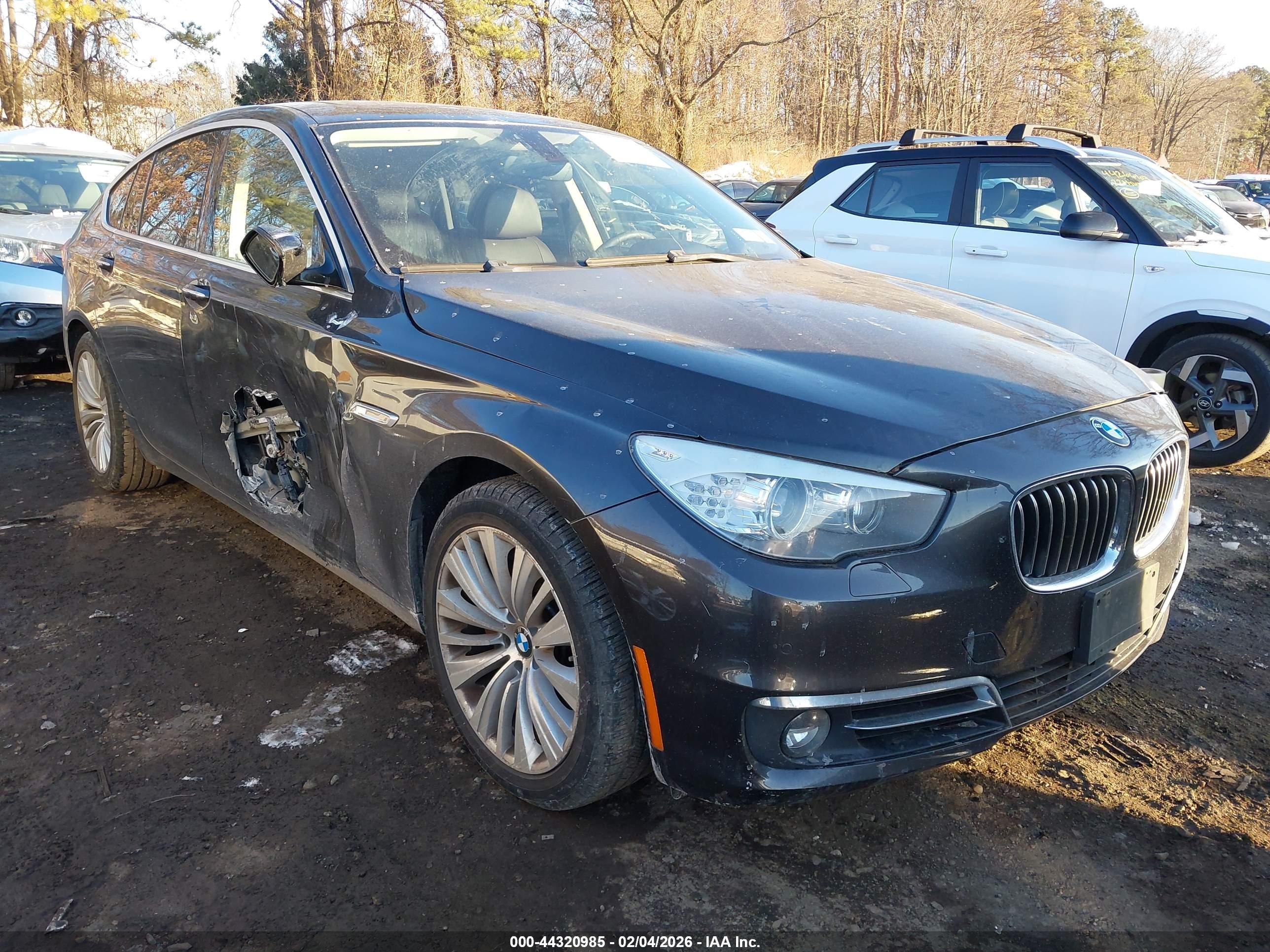 2016 BMW 5 Series 535i Gran Turismo, VIN WBA5M2C5XGGH99400 — Side
