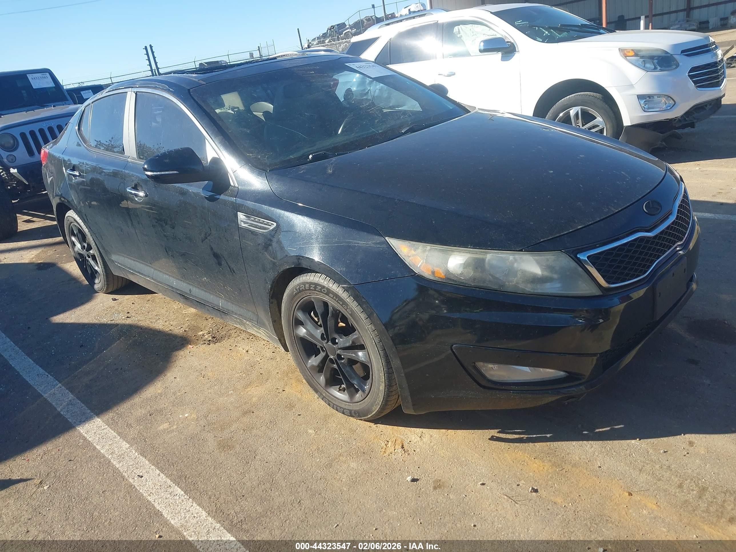 2012 Kia Optima EX, VIN 5XXGN4A69CG040915 — Storm