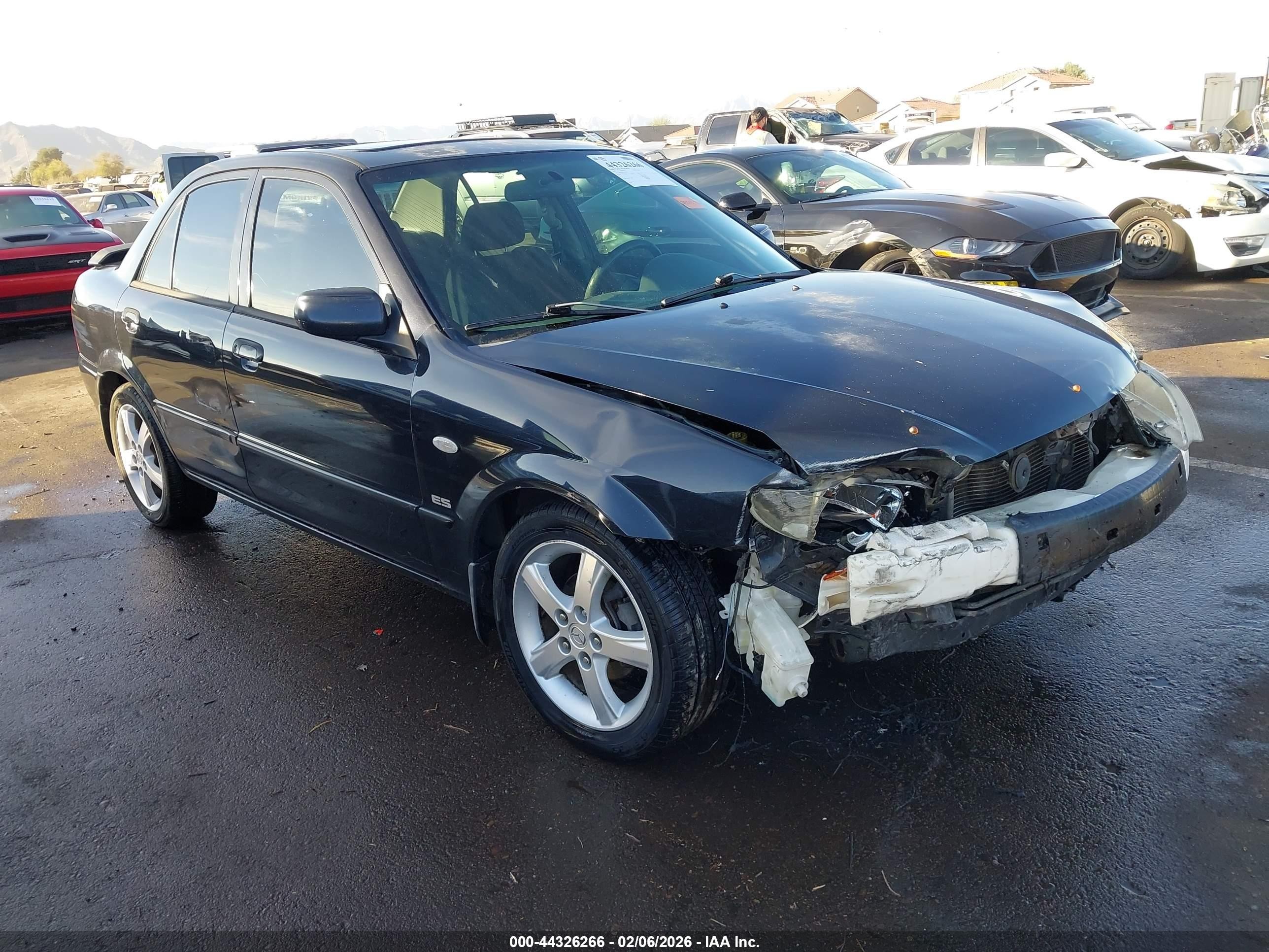 2003 Mazda Protege DX, VIN JM1BJ226231191907 — Перед