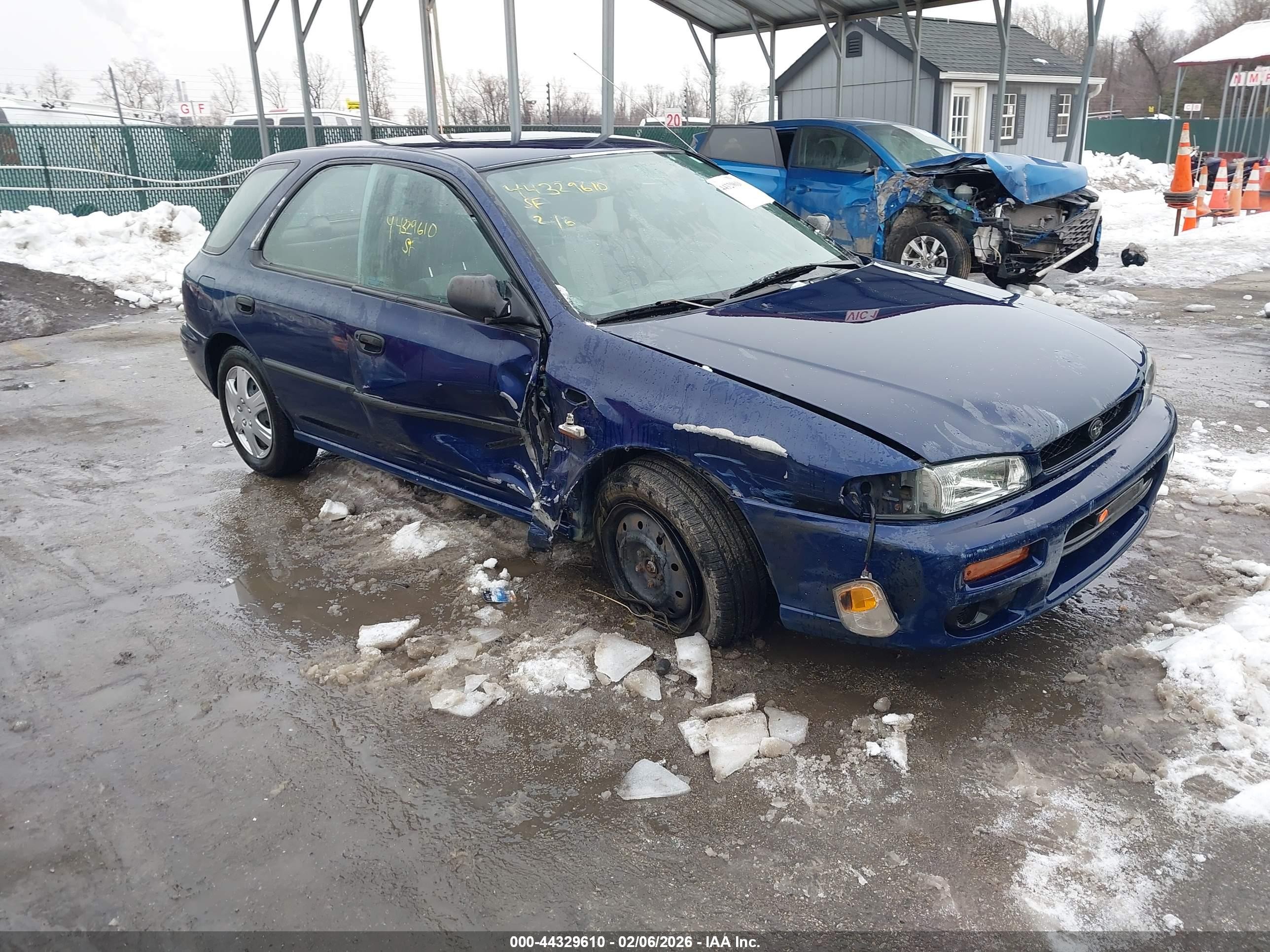 2000 Subaru Impreza L, VIN JF1GF4358YH810829 — Side