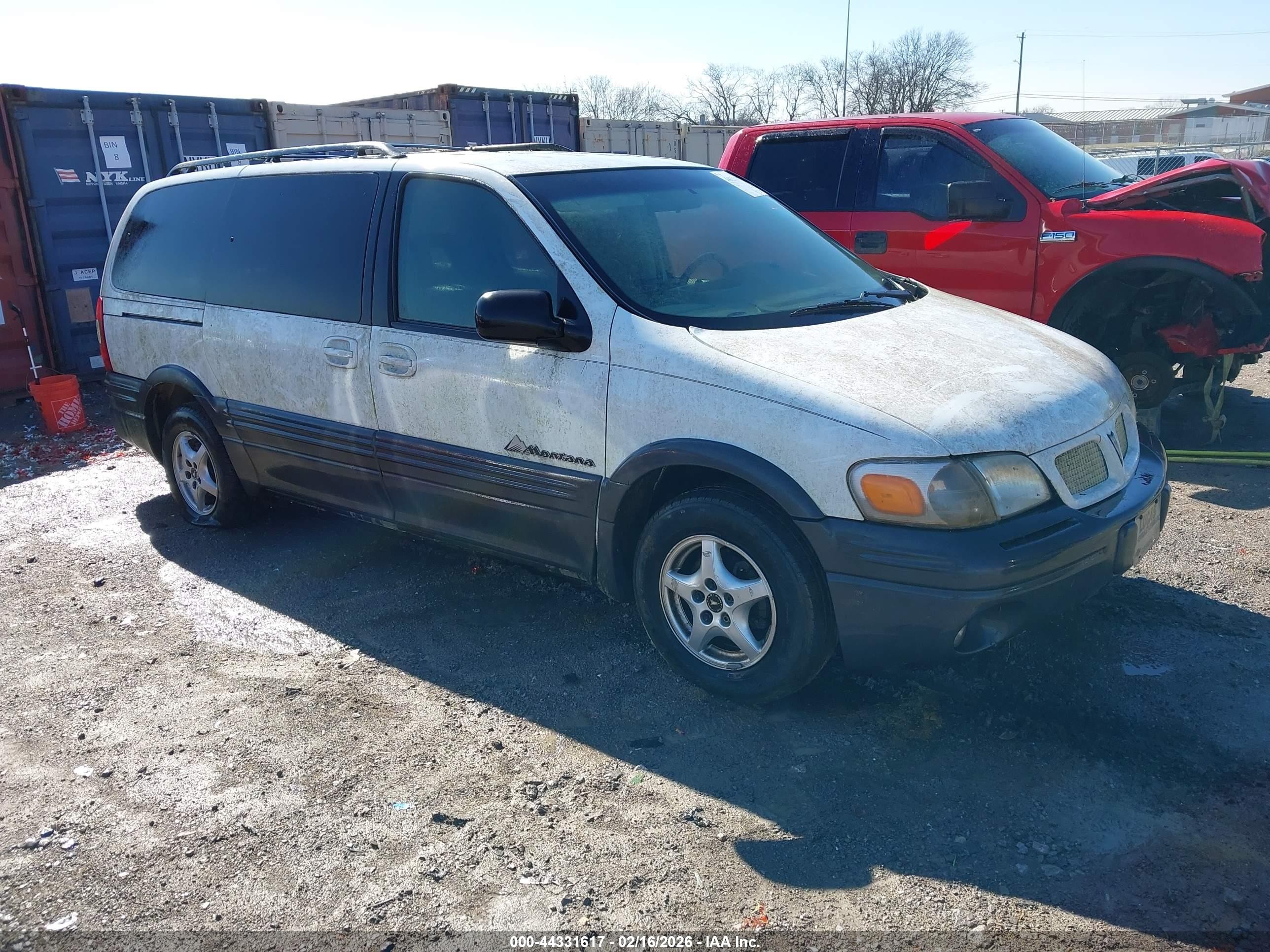 1999 Pontiac Montana, VIN 1GMDX03E0XD250101 — Normal wear