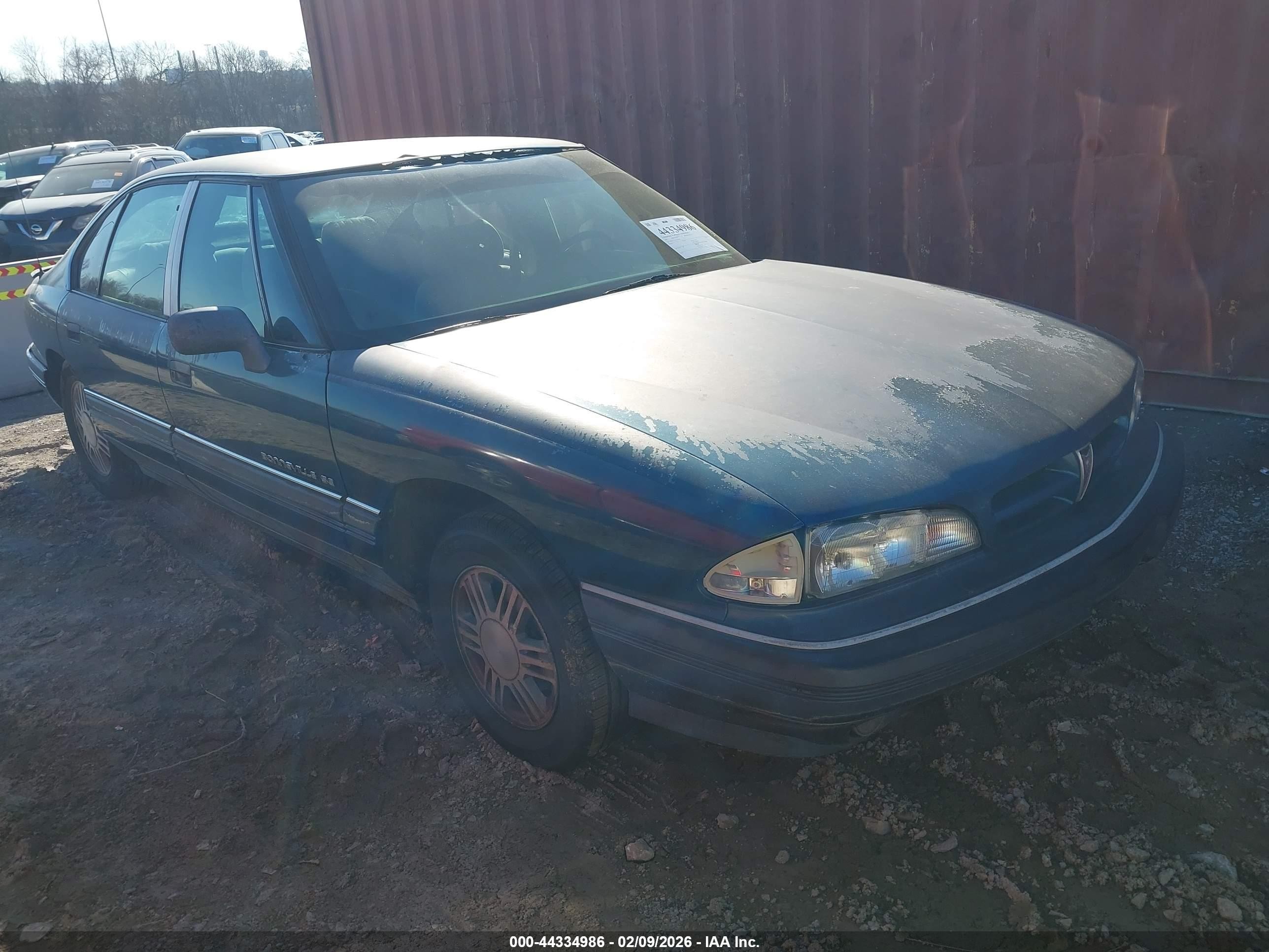 1992 Pontiac Bonneville SE, VIN 1G2HX53L1N1226748 — Side